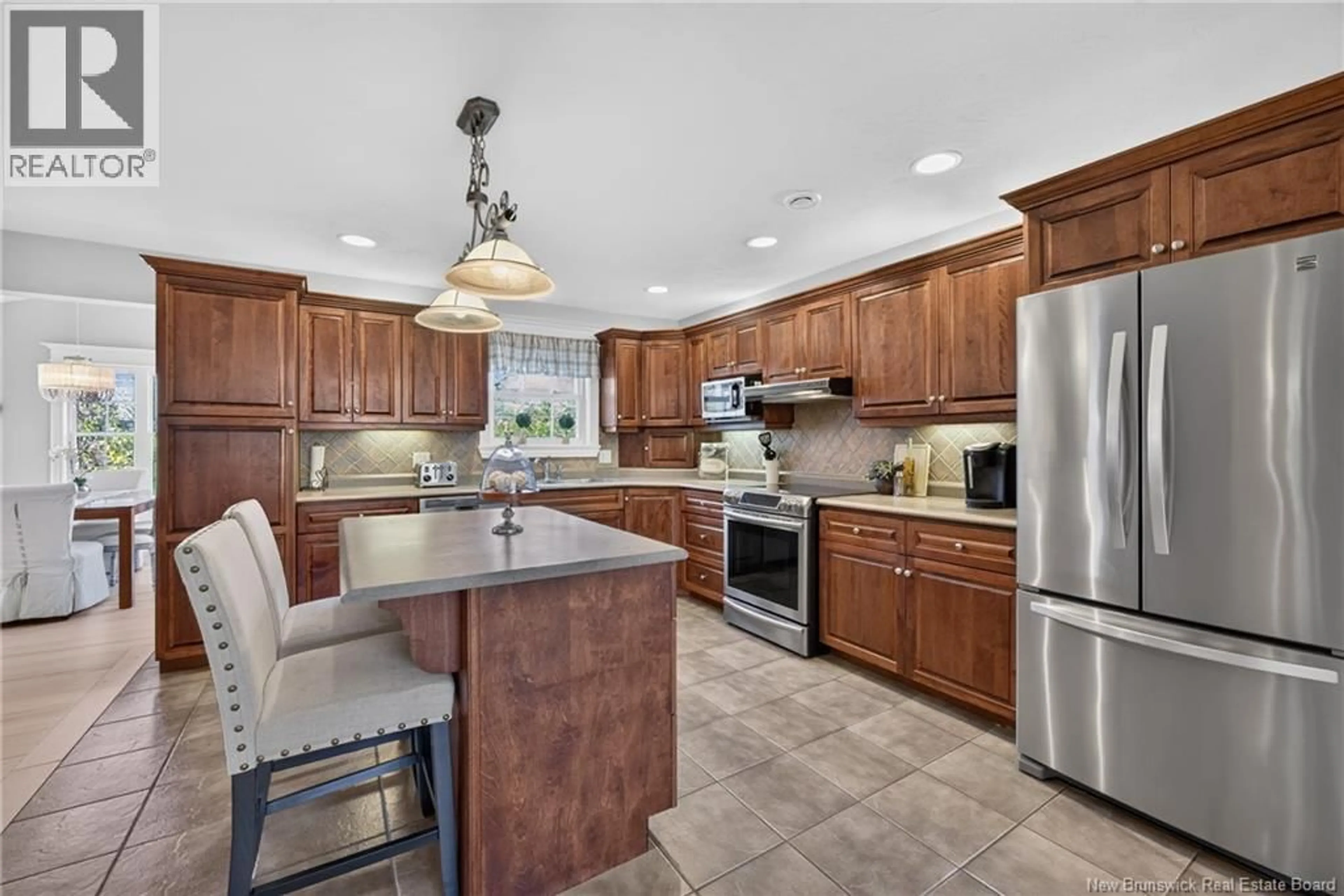 Open concept kitchen, ceramic/tile floor for 51 GLEN EYRE COURT, Fredericton New Brunswick E3C2P7