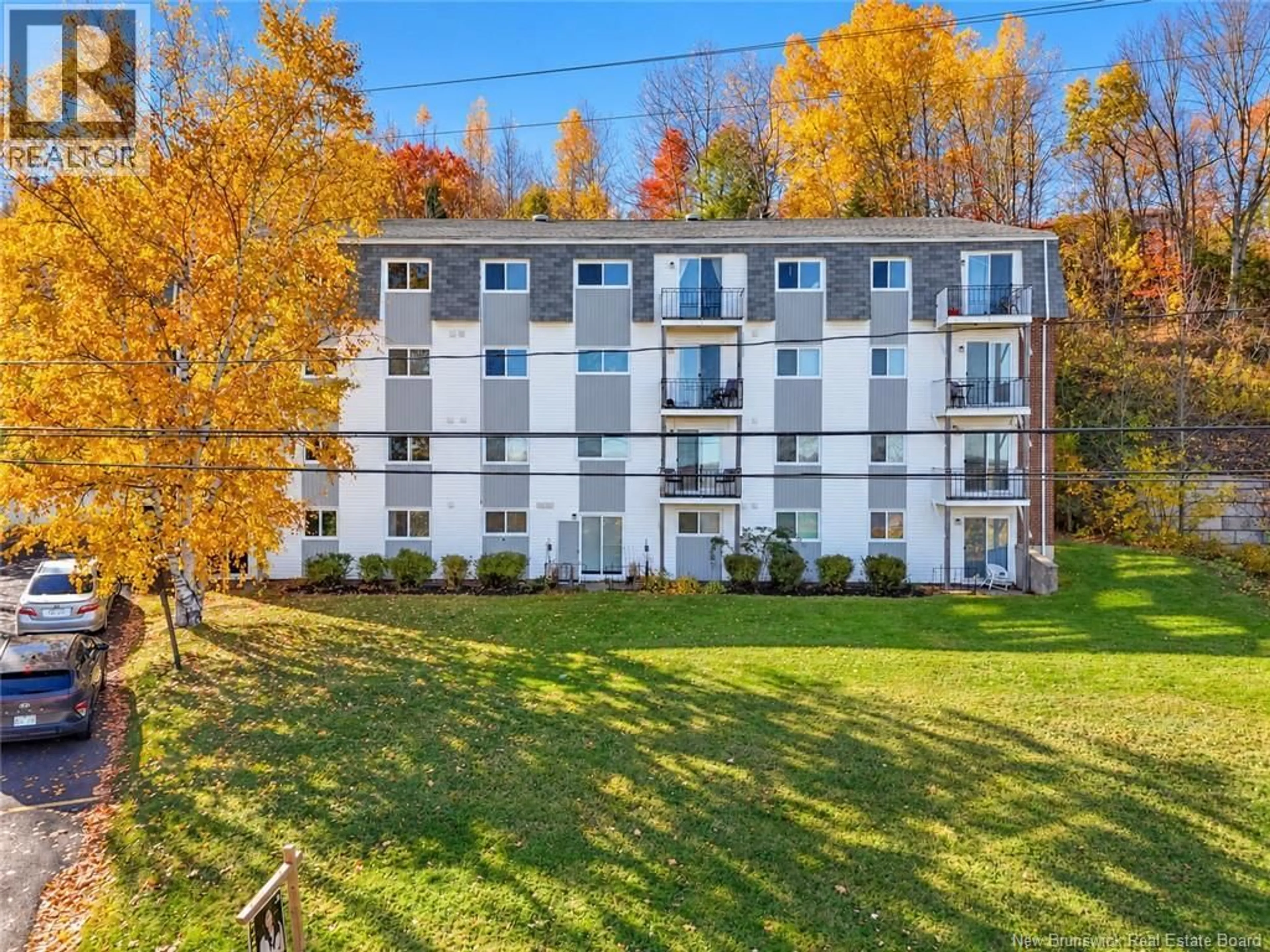 A pic from outside/outdoor area/front of a property/back of a property/a pic from drone, unknown for 8 - 228 DUNNS CROSSING ROAD, Fredericton New Brunswick E3A2A6