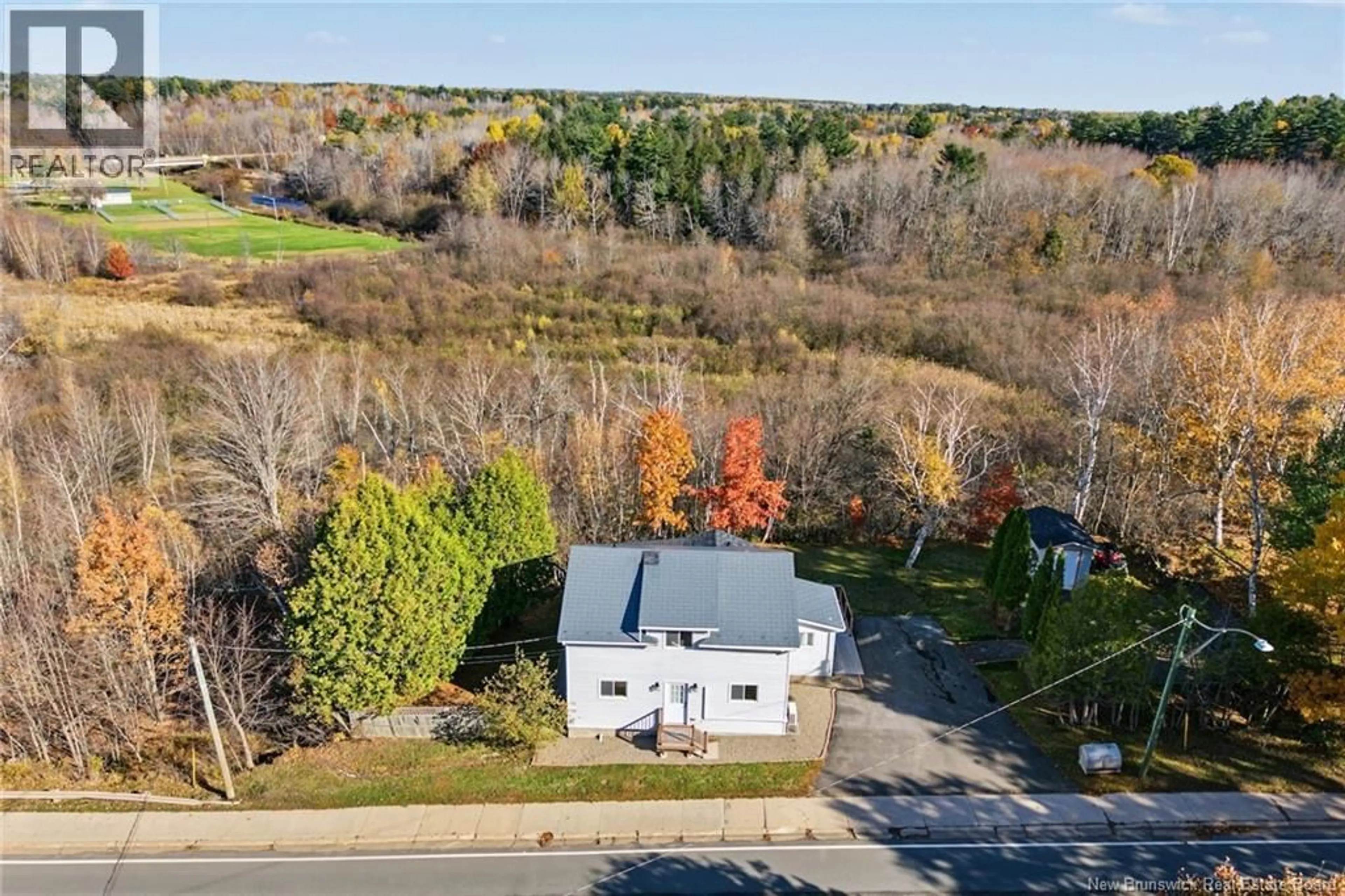 A pic from outside/outdoor area/front of a property/back of a property/a pic from drone, unknown for 56 MAIN STREET, Minto New Brunswick E4B3K5
