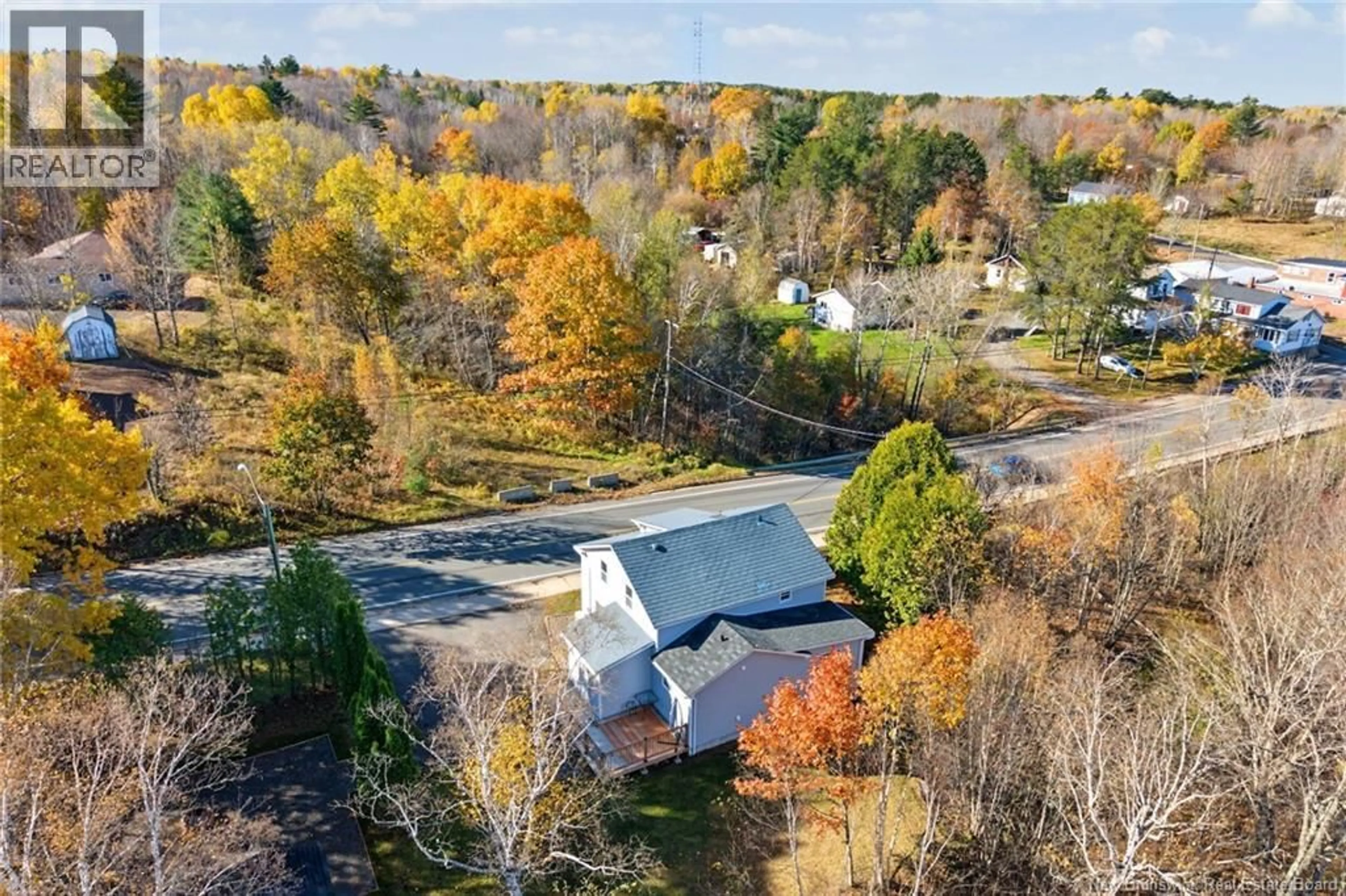 A pic from outside/outdoor area/front of a property/back of a property/a pic from drone, unknown for 56 MAIN STREET, Minto New Brunswick E4B3K5