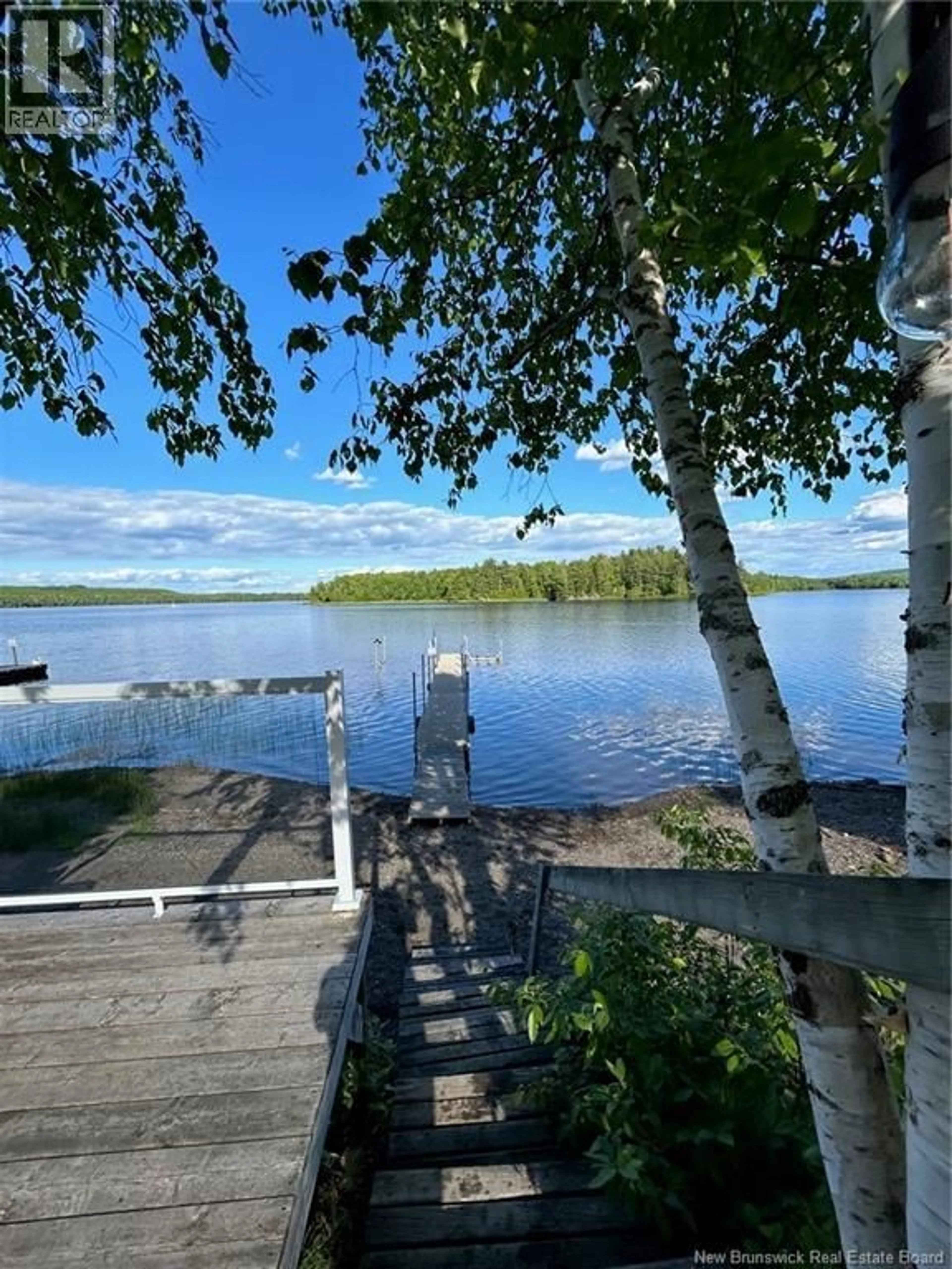 A pic from outside/outdoor area/front of a property/back of a property/a pic from drone, water/lake/river/ocean view for 105 MILL ROAD, First Eel Lake New Brunswick E7N2N9