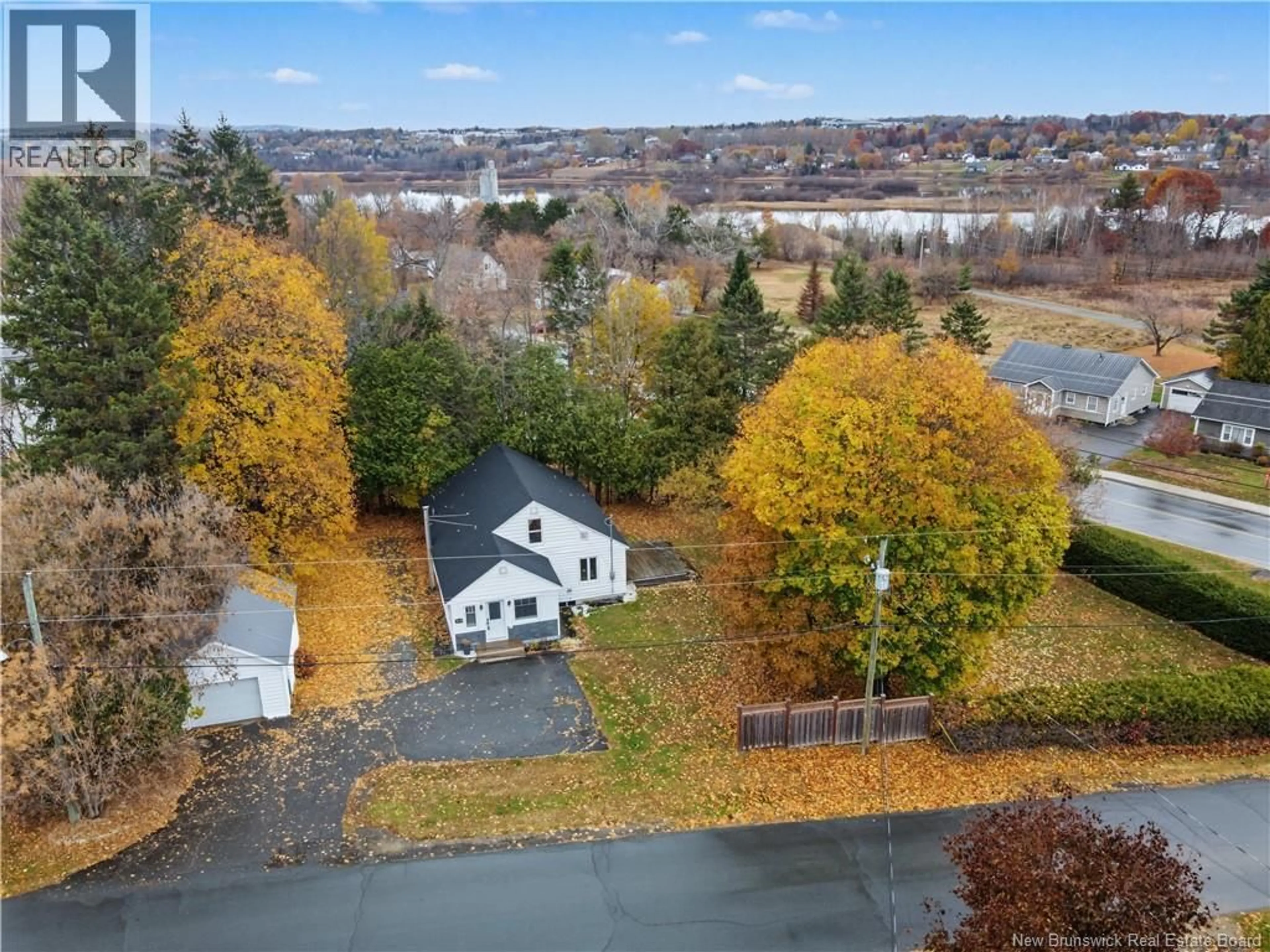 A pic from outside/outdoor area/front of a property/back of a property/a pic from drone, unknown for 108 POOLE STREET, Woodstock New Brunswick E7M2L7