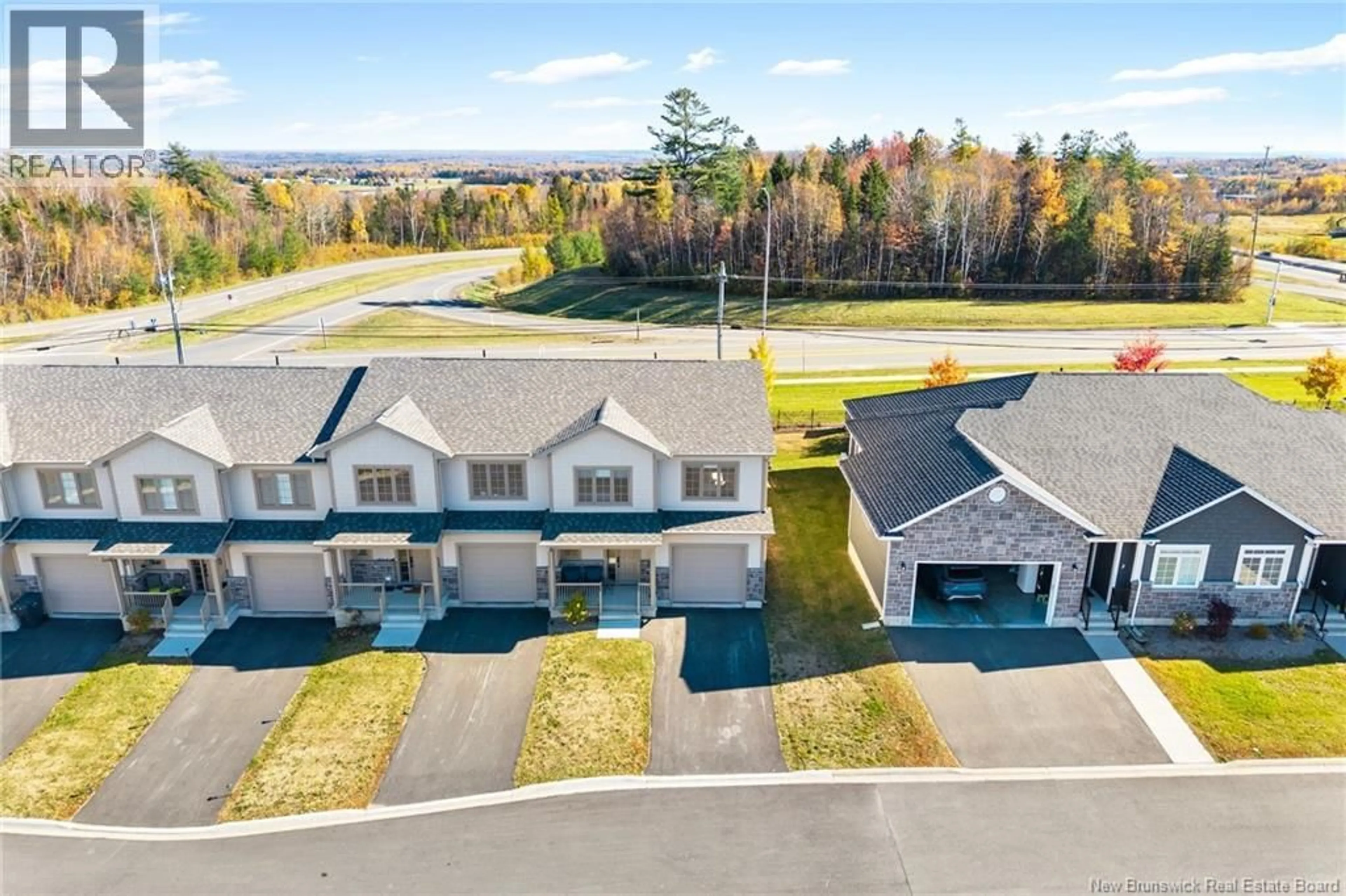 A pic from outside/outdoor area/front of a property/back of a property/a pic from drone, mountain view for 2 HUNTINGDON CIRCLE, Fredericton New Brunswick E3B0L9