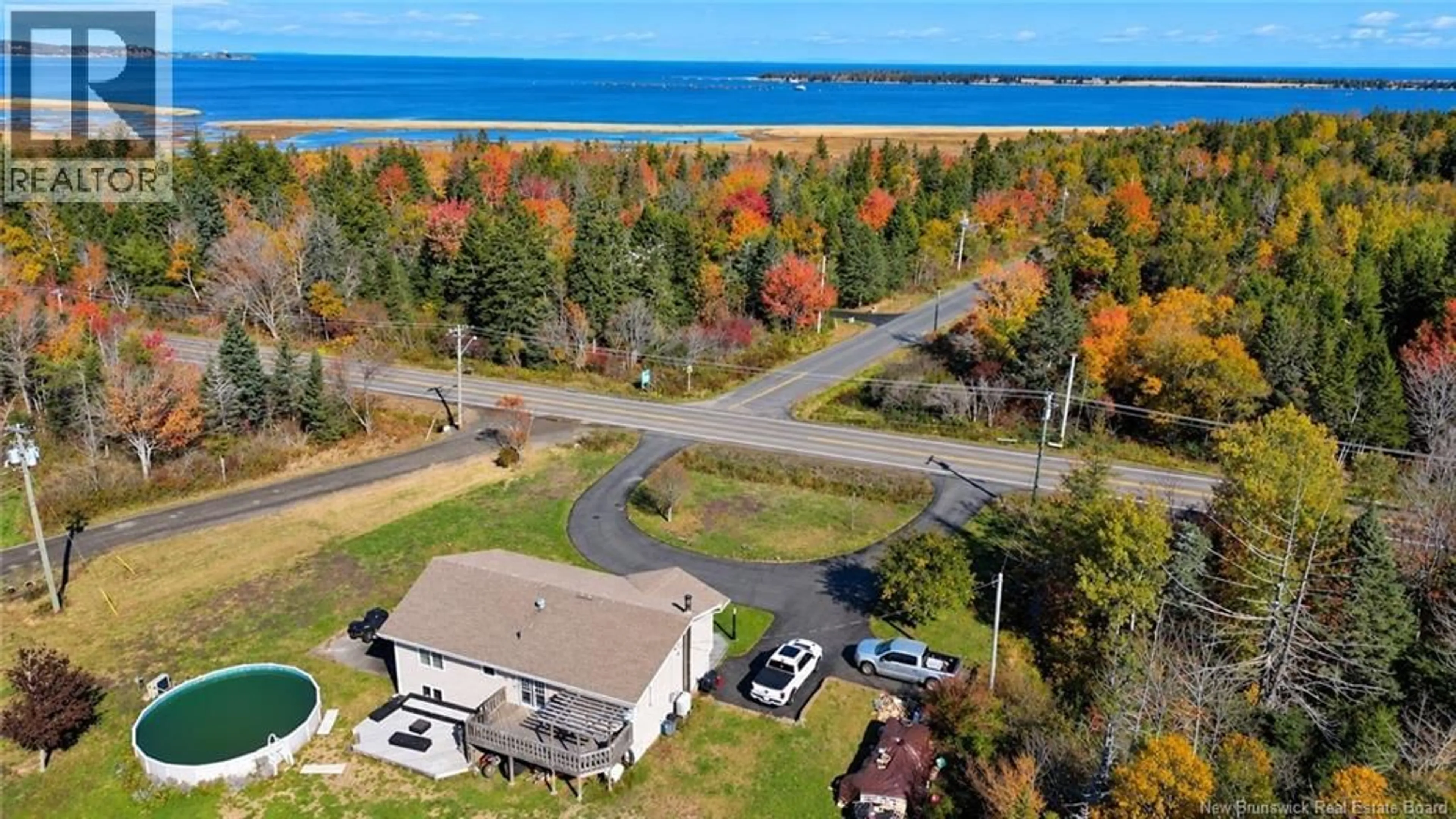 A pic from outside/outdoor area/front of a property/back of a property/a pic from drone, water/lake/river/ocean view for 710 ROUTE 776, Grand Manan New Brunswick E5G3C3
