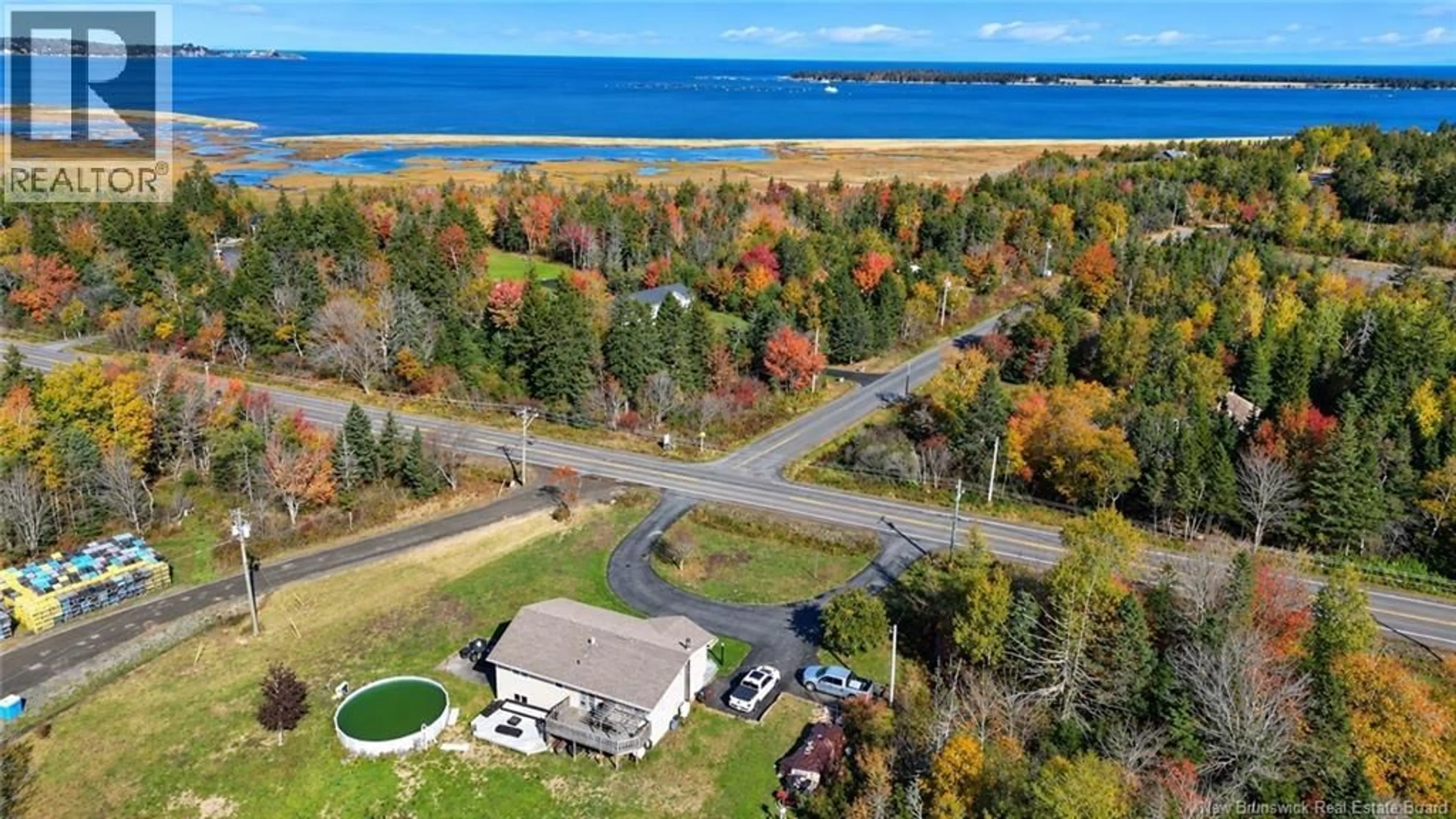 A pic from outside/outdoor area/front of a property/back of a property/a pic from drone, water/lake/river/ocean view for 710 ROUTE 776, Grand Manan New Brunswick E5G3C3