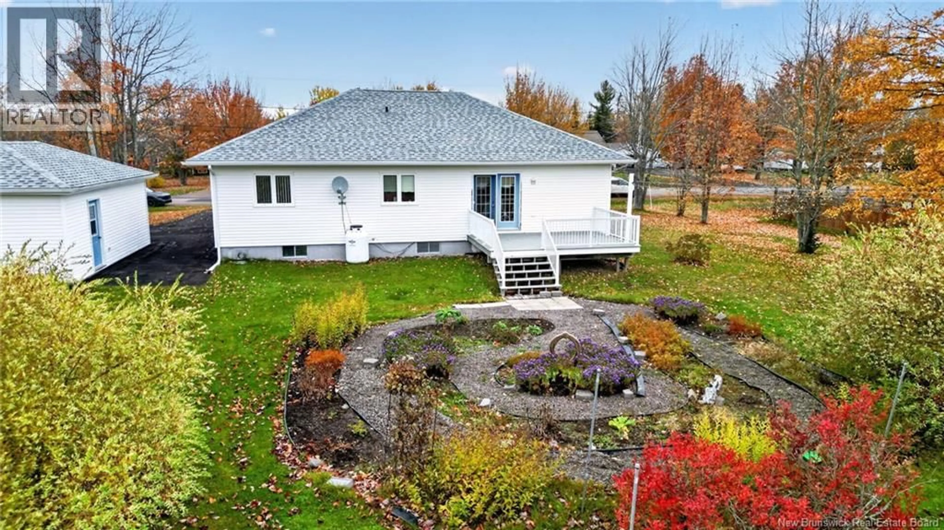 A pic from outside/outdoor area/front of a property/back of a property/a pic from drone, water/lake/river/ocean view for 104 LEGER, Saint-Antoine New Brunswick E4V1J7