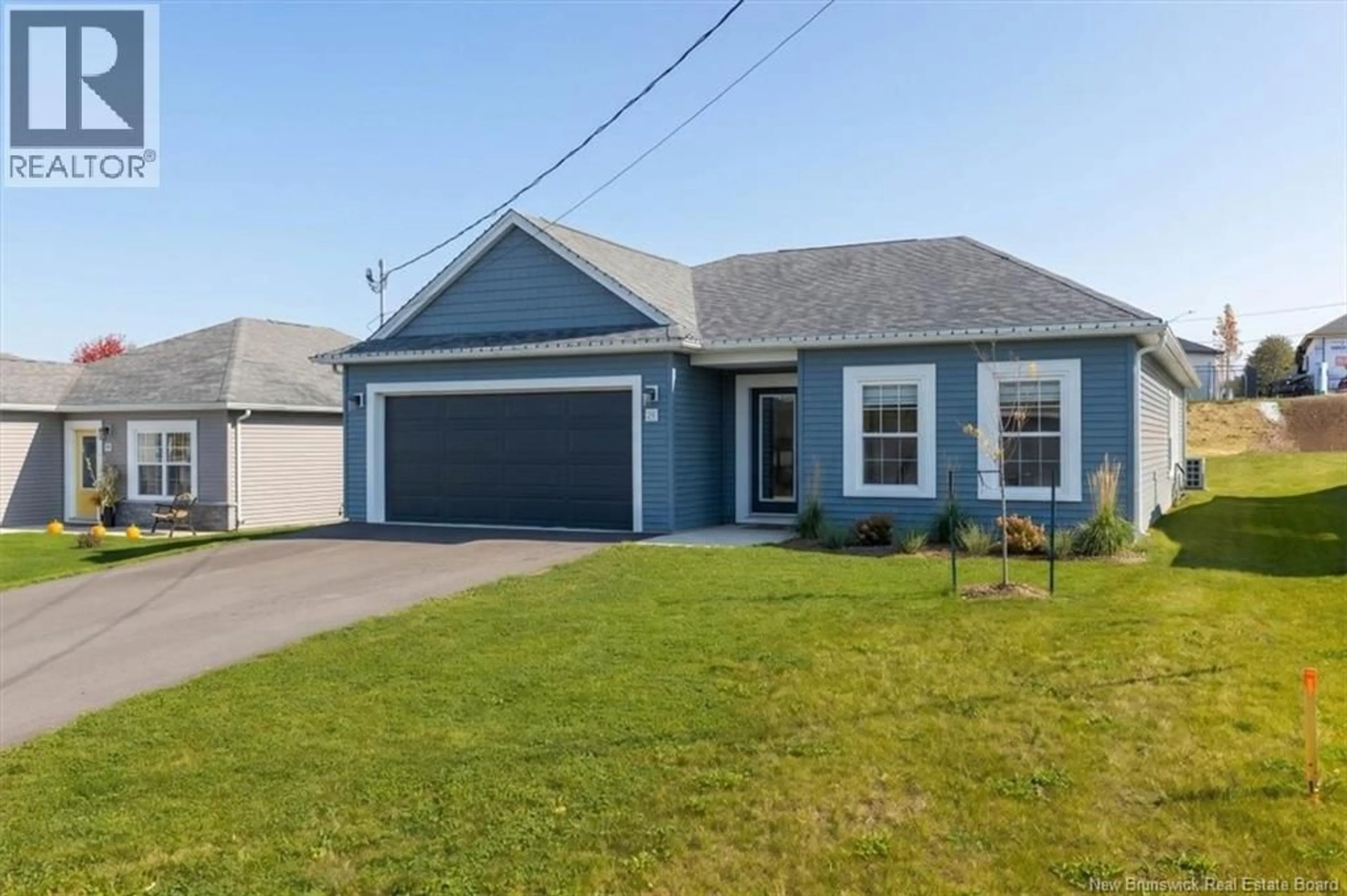 Home with vinyl exterior material, street for 26 BUCHANAN DRIVE, Sussex Corner New Brunswick E4E0B6