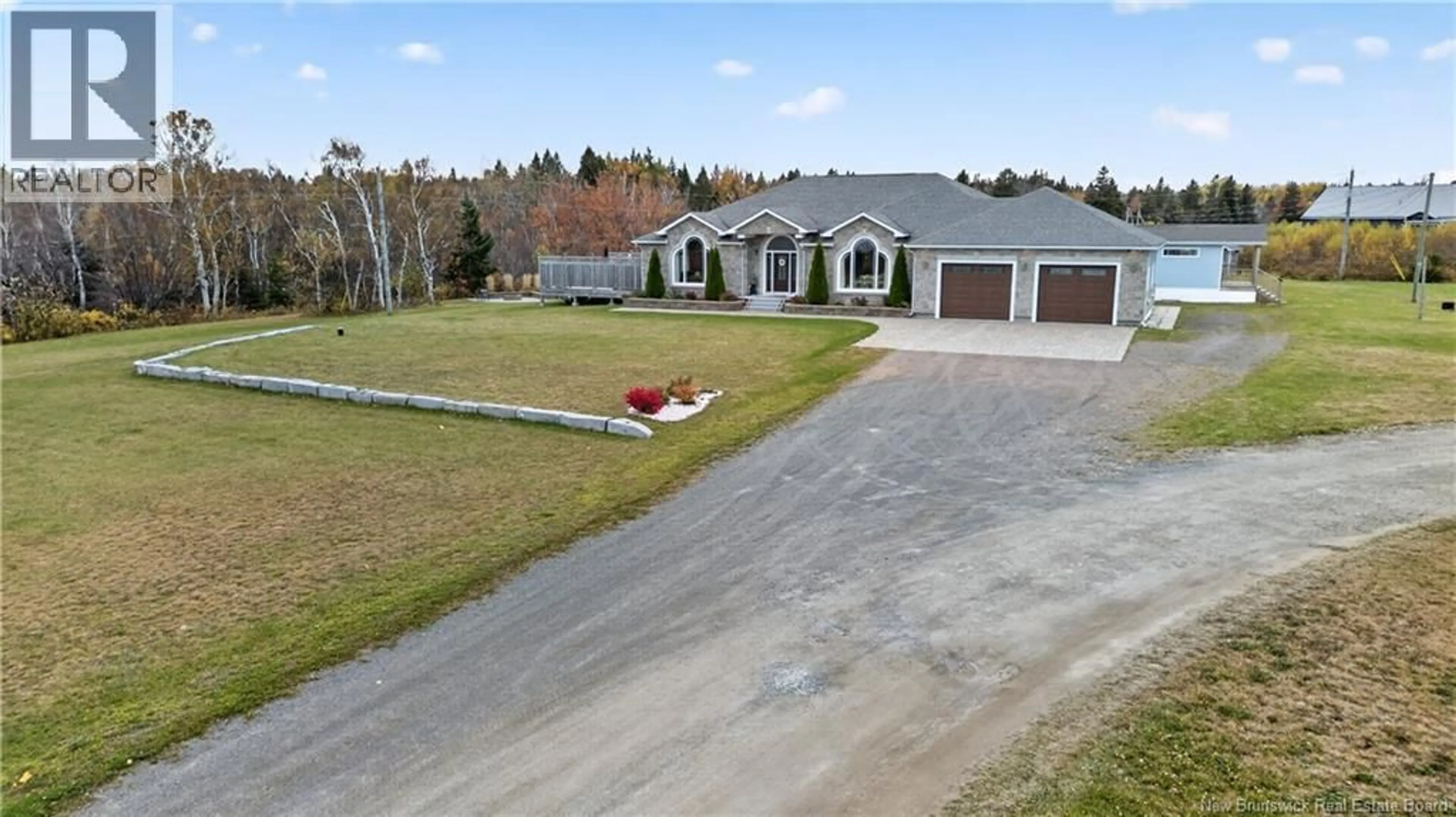 A pic from outside/outdoor area/front of a property/back of a property/a pic from drone, street for 11 RAGIN CAJUN LANE, Cocagne New Brunswick E4R0E8