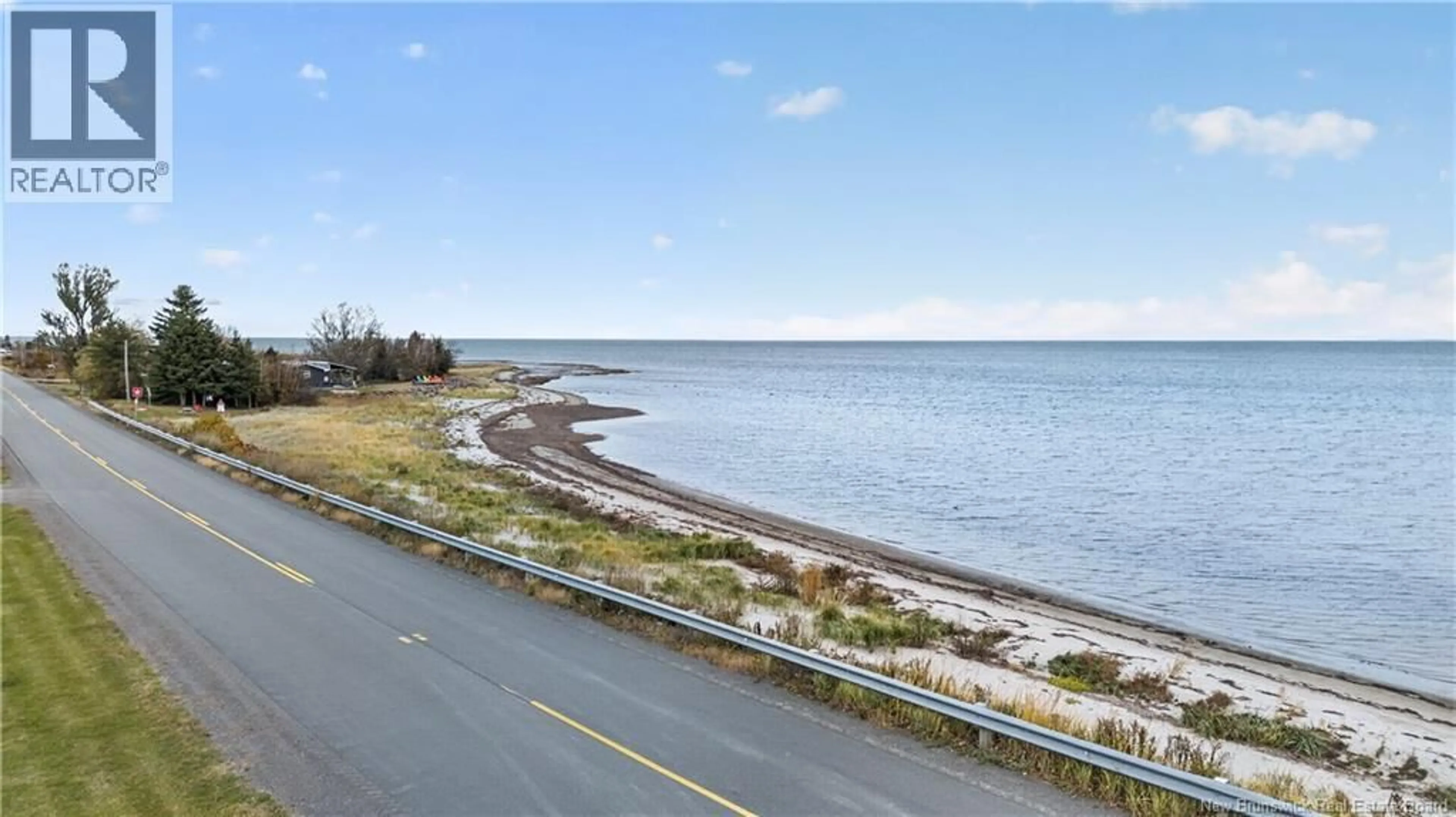A pic from outside/outdoor area/front of a property/back of a property/a pic from drone, water/lake/river/ocean view for 11 RAGIN CAJUN LANE, Cocagne New Brunswick E4R0E8