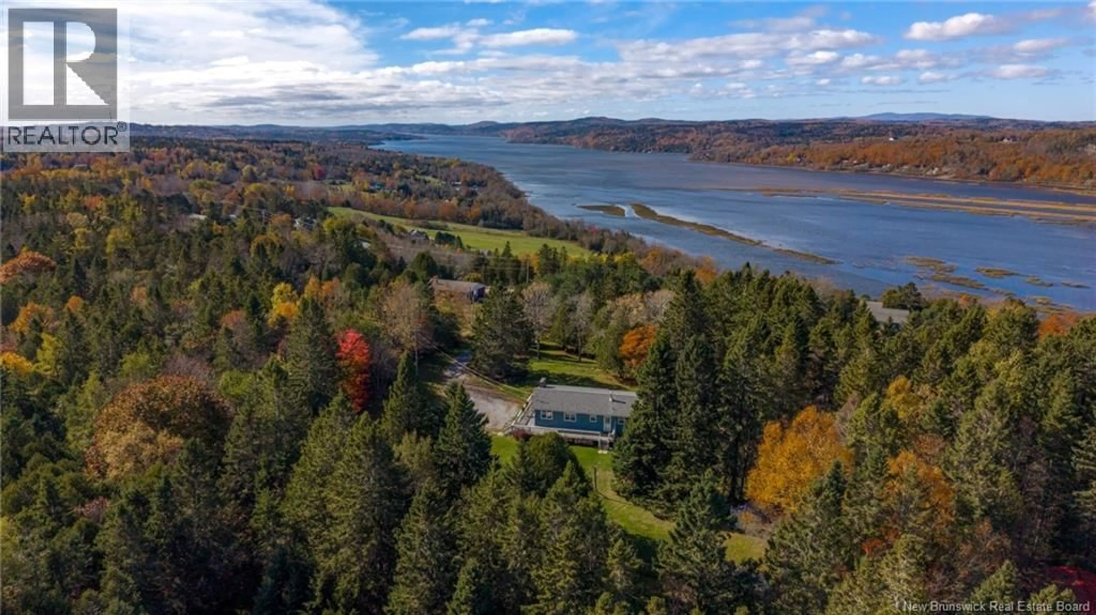 A pic from outside/outdoor area/front of a property/back of a property/a pic from drone, water/lake/river/ocean view for 44 NECK ROAD, Quispamsis New Brunswick E2G1J5