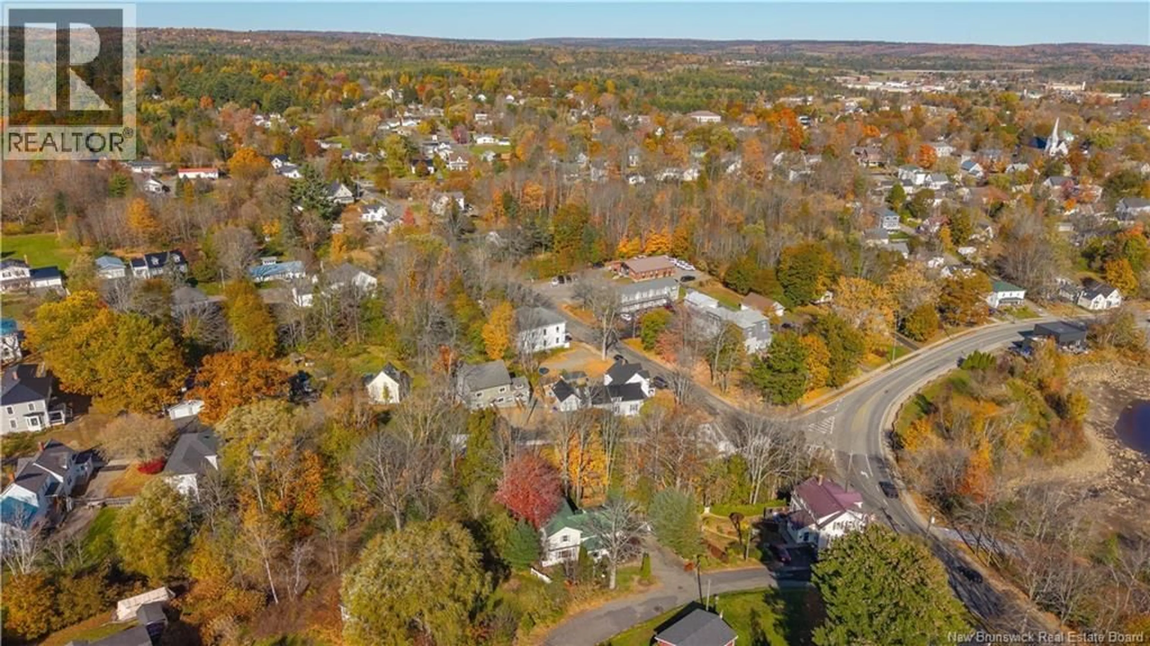 A pic from outside/outdoor area/front of a property/back of a property/a pic from drone, street for 5 HARTFOD LANE, St. Stephen New Brunswick E3L1P9