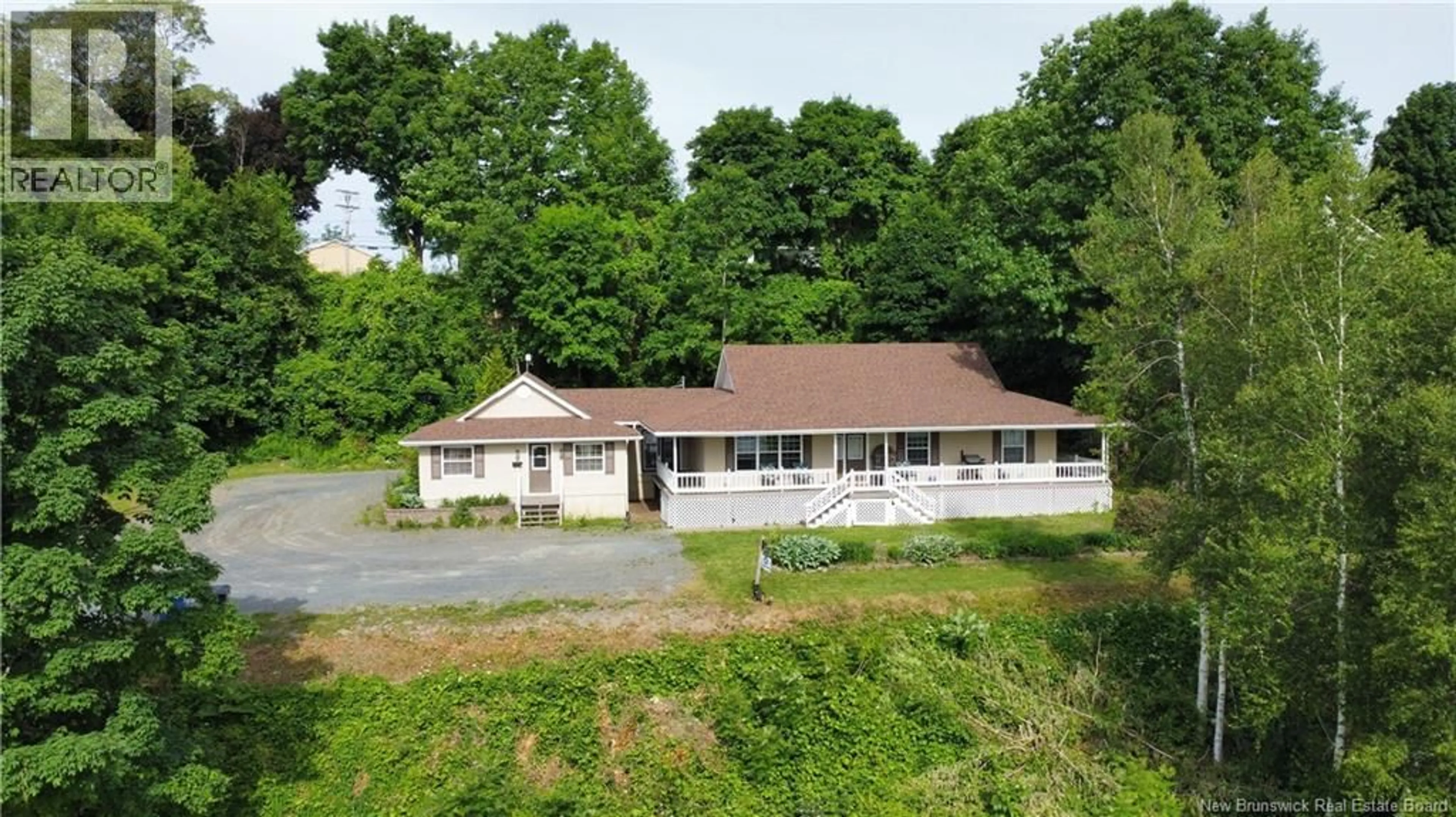 A pic from outside/outdoor area/front of a property/back of a property/a pic from drone, building for 105 BRIDGE STREET, Woodstock New Brunswick E7M5Y7