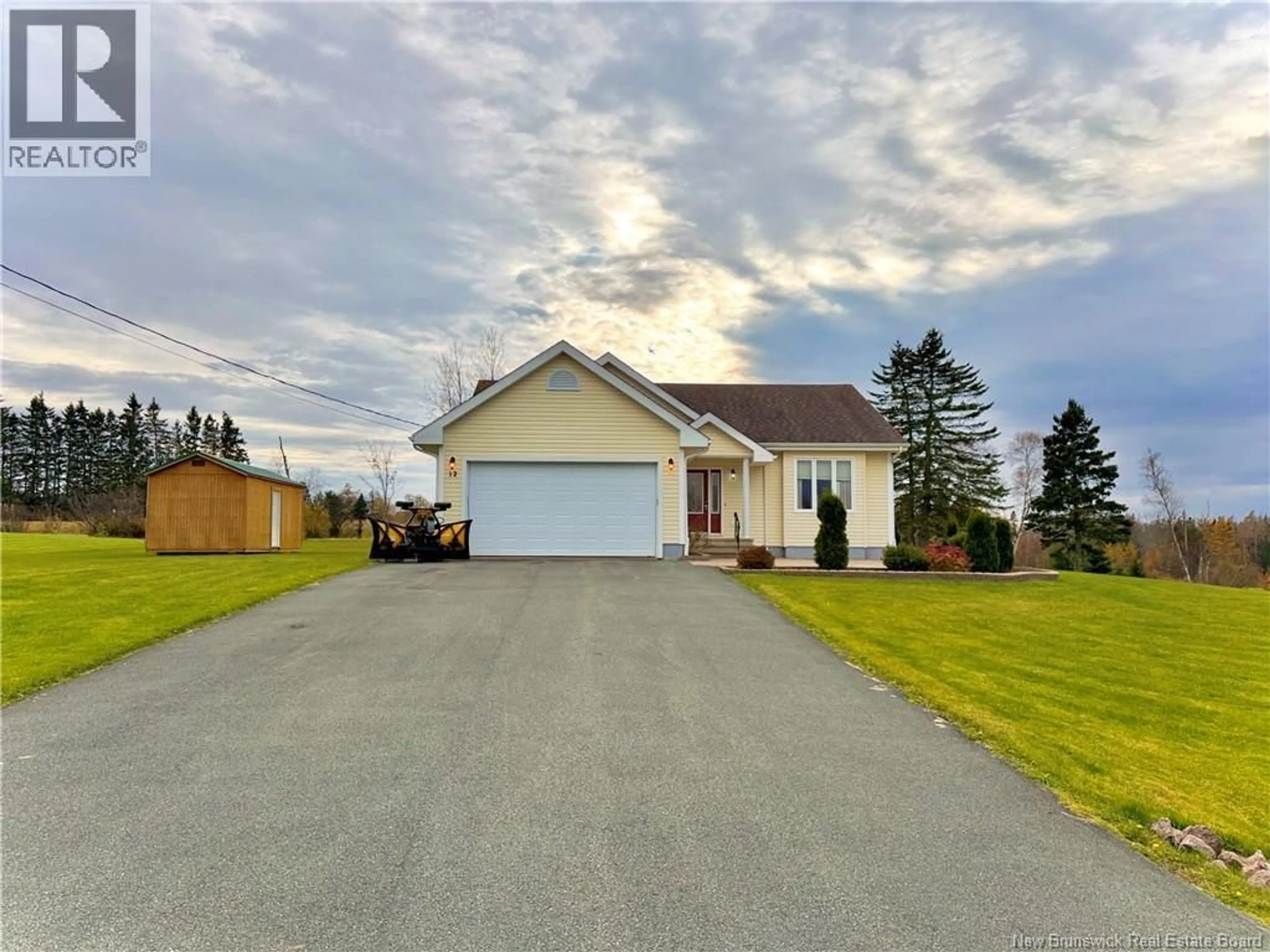 A pic from outside/outdoor area/front of a property/back of a property/a pic from drone, street for 12 RIDGEWOOD DRIVE, Sackville New Brunswick E4L4T7
