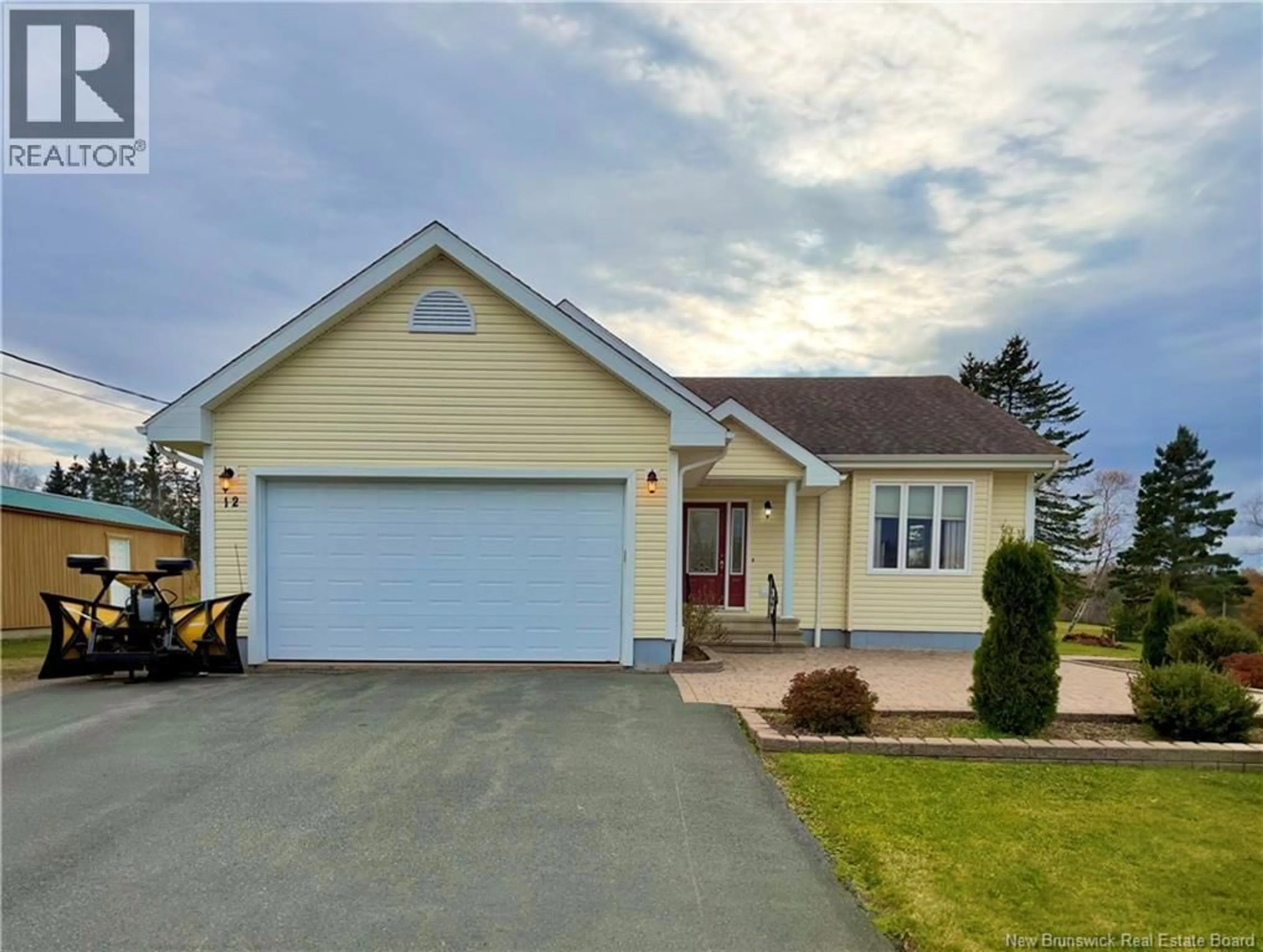 Home with vinyl exterior material, street for 12 RIDGEWOOD DRIVE, Sackville New Brunswick E4L4T7