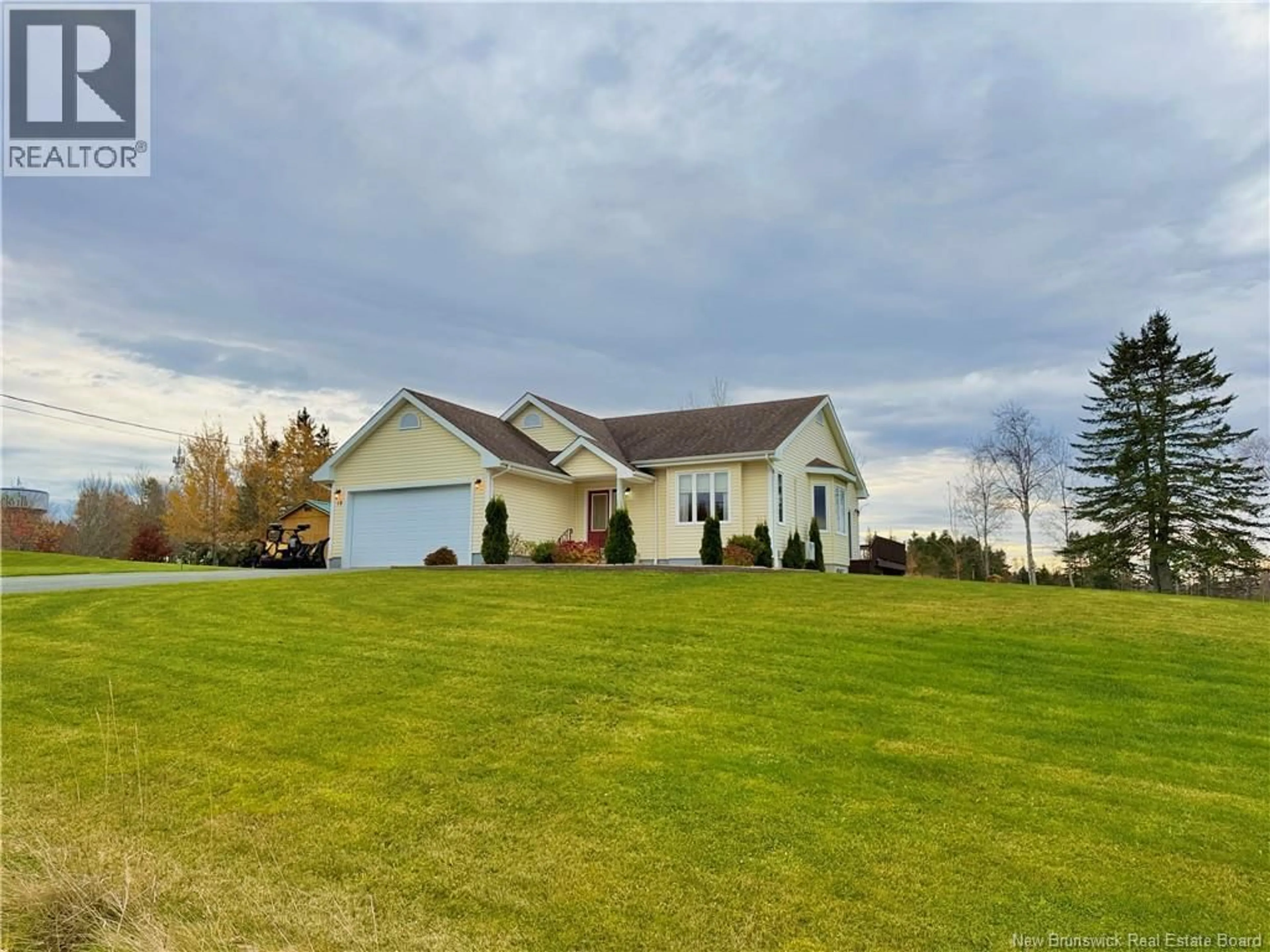 A pic from outside/outdoor area/front of a property/back of a property/a pic from drone, water/lake/river/ocean view for 12 RIDGEWOOD DRIVE, Sackville New Brunswick E4L4T7