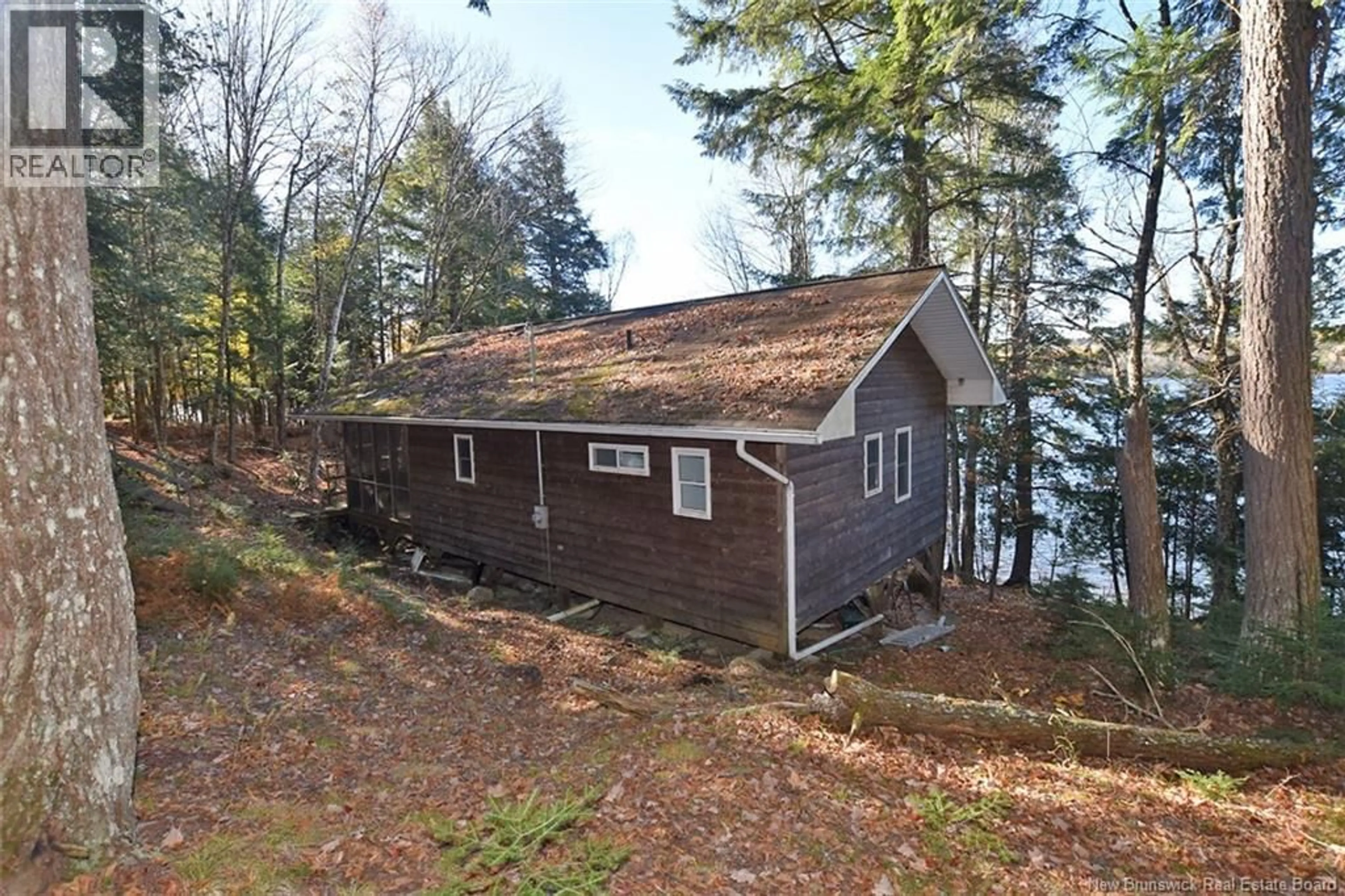 A pic from outside/outdoor area/front of a property/back of a property/a pic from drone, water/lake/river/ocean view for 124 HEADPOND LANE, Keswick Ridge New Brunswick E6L0B5