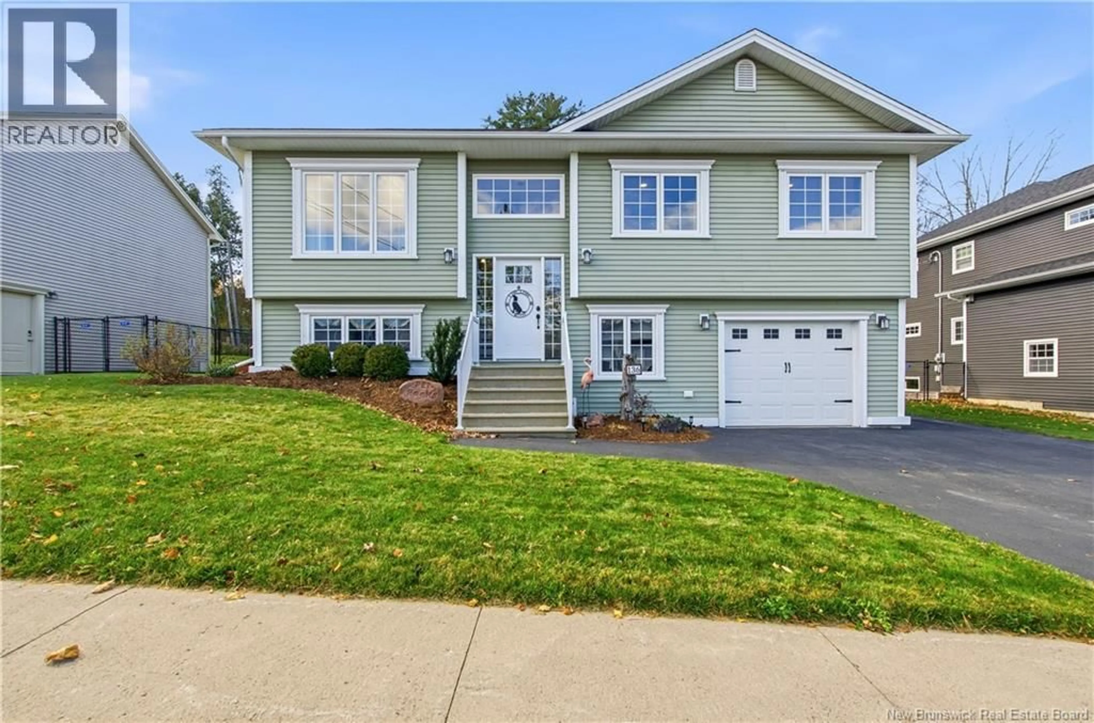 Home with vinyl exterior material, street for 136 MOOERS DRIVE, Fredericton New Brunswick E3C0J6