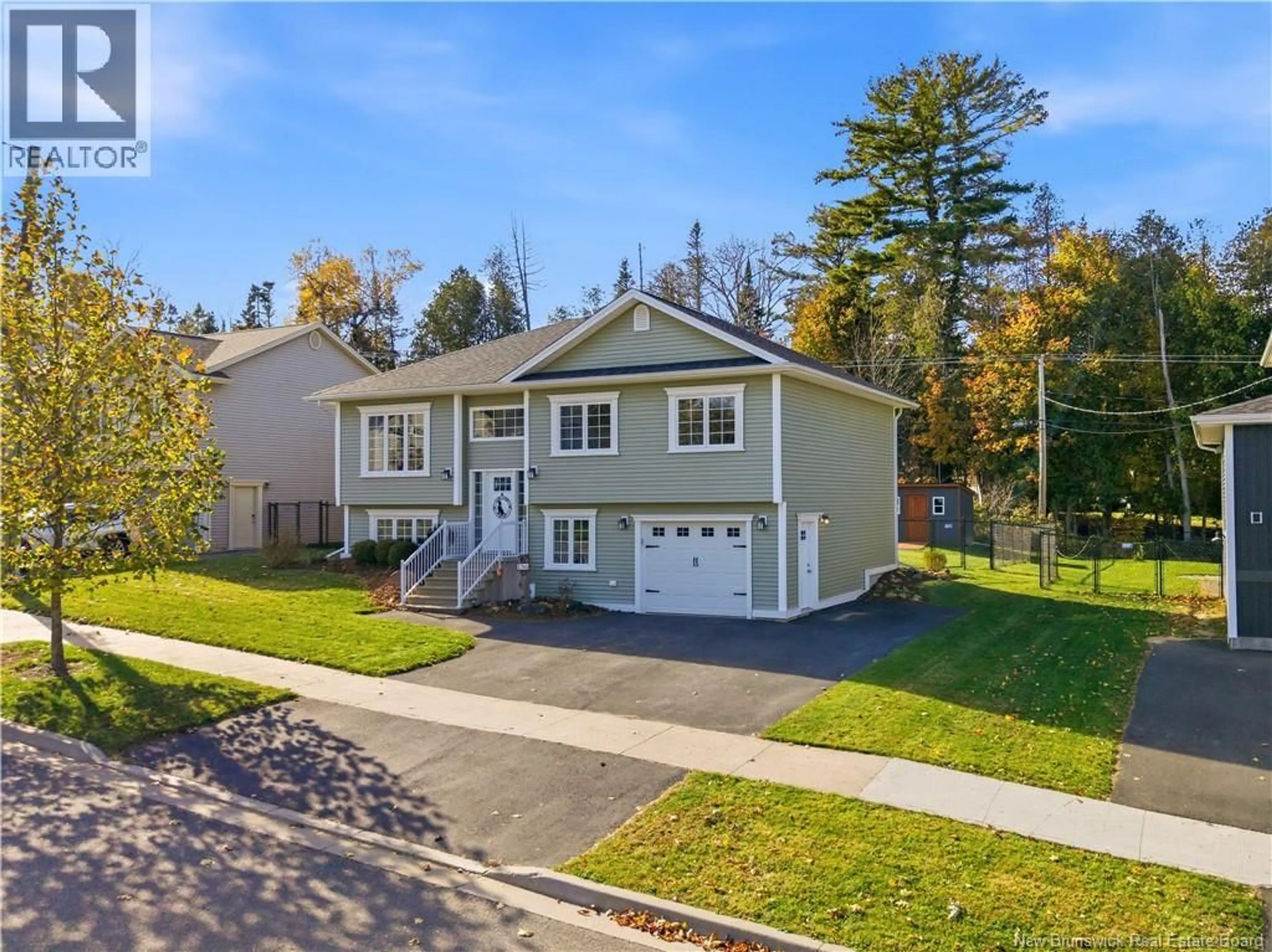 Home with vinyl exterior material, street for 136 MOOERS DRIVE, Fredericton New Brunswick E3C0J6