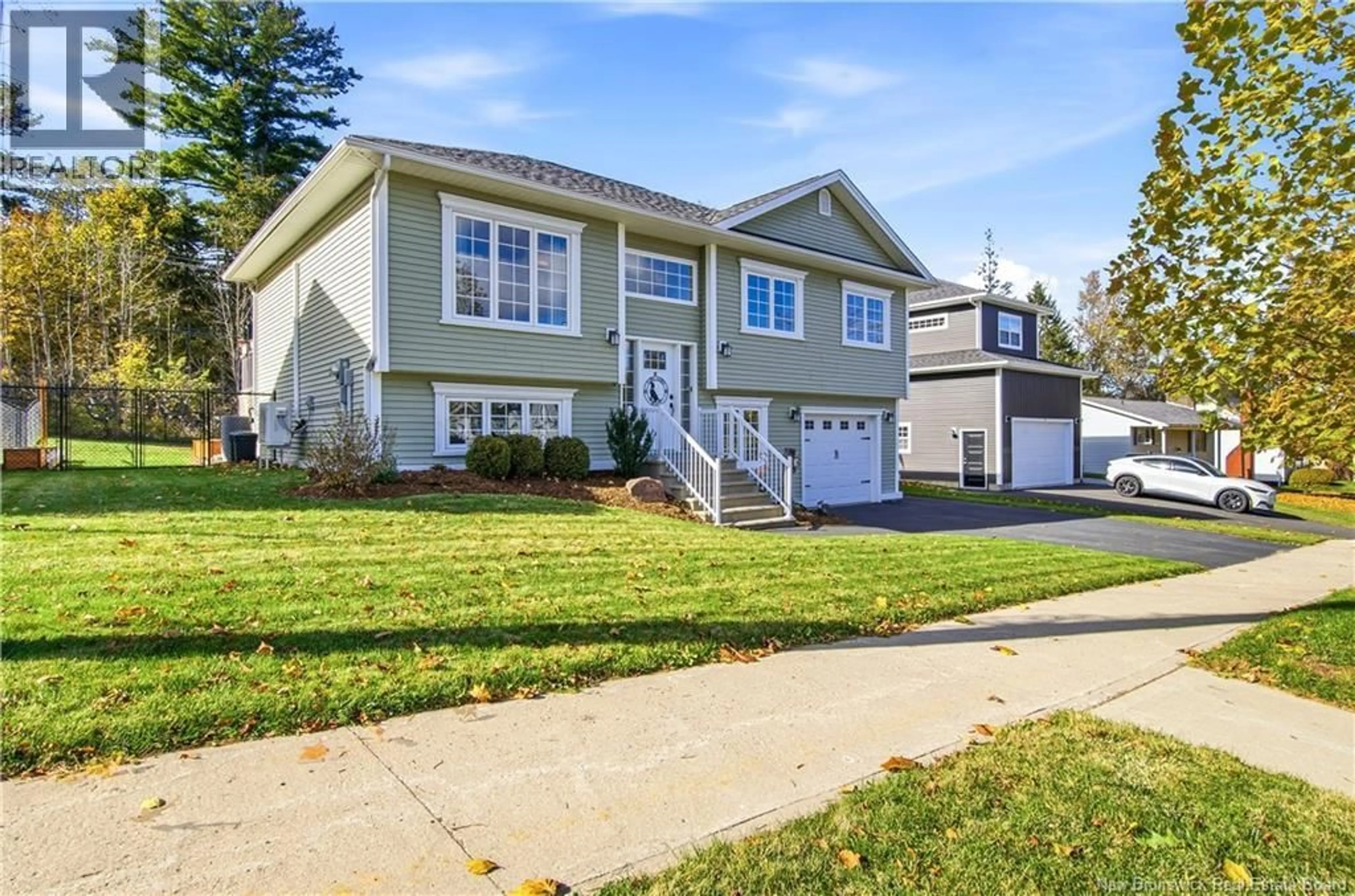 Home with vinyl exterior material, street for 136 MOOERS DRIVE, Fredericton New Brunswick E3C0J6