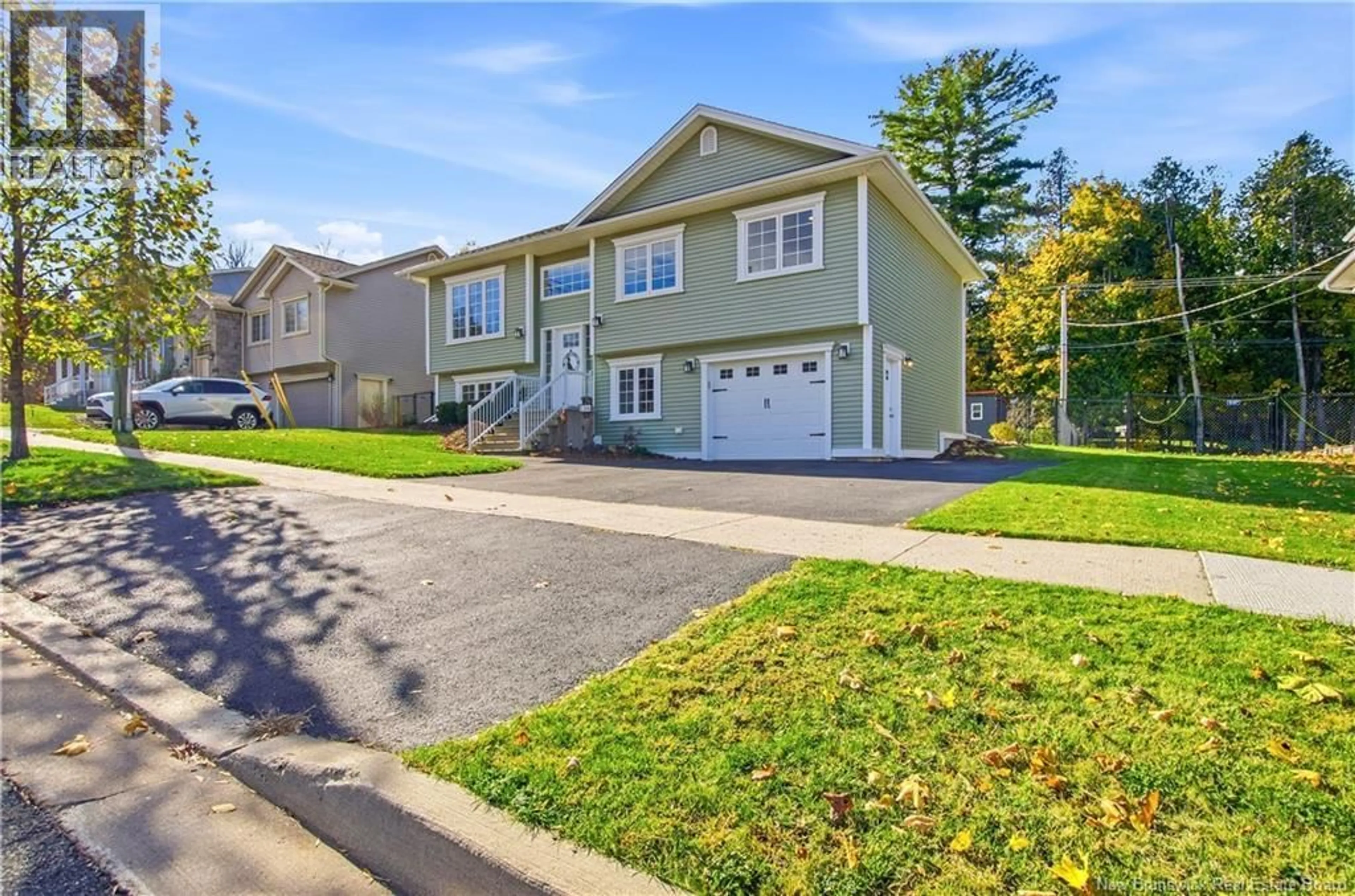 Home with vinyl exterior material, street for 136 MOOERS DRIVE, Fredericton New Brunswick E3C0J6