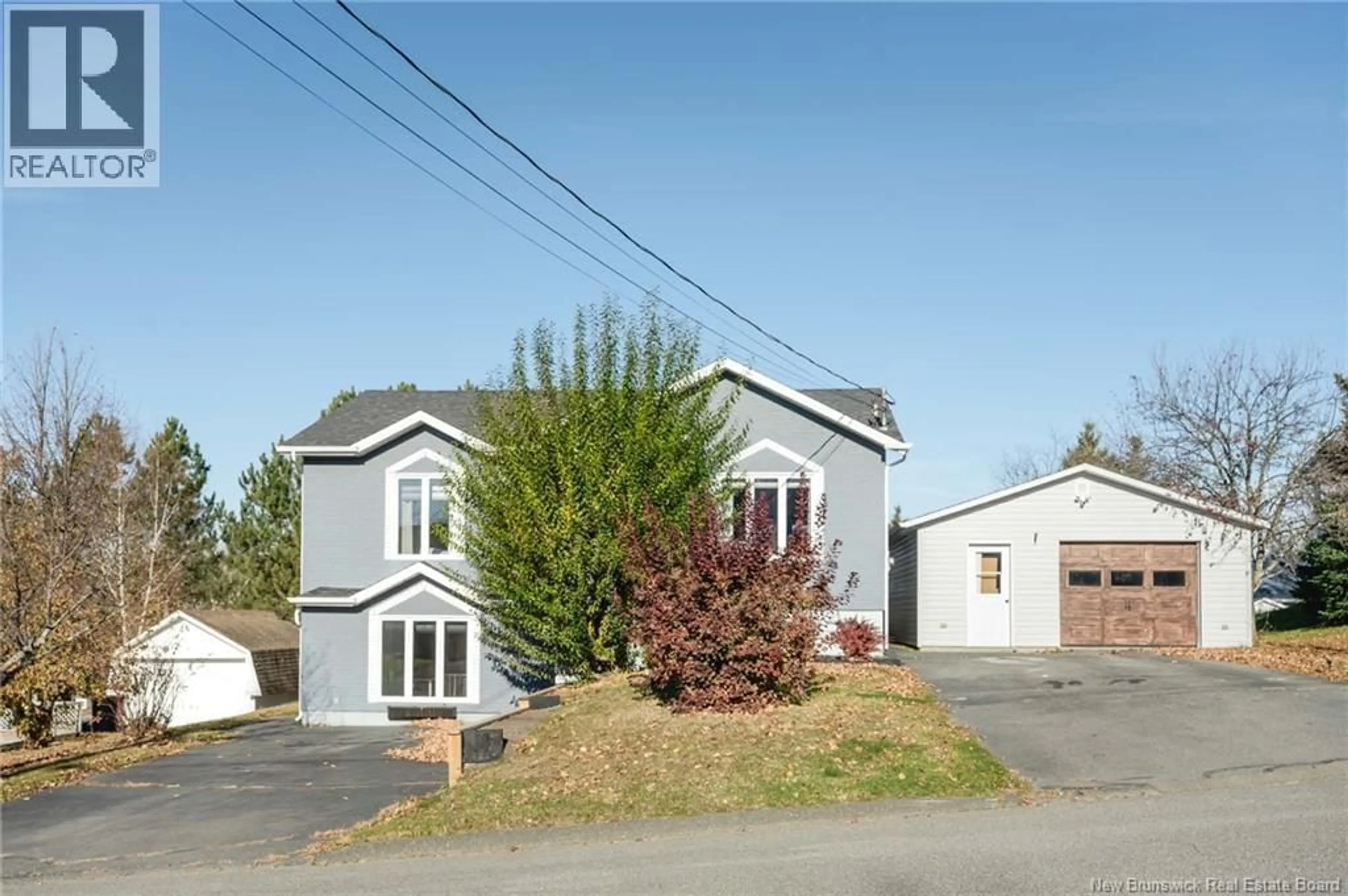 Home with vinyl exterior material, street for 4 MGR ROY AVE, Edmundston New Brunswick E3V4G4