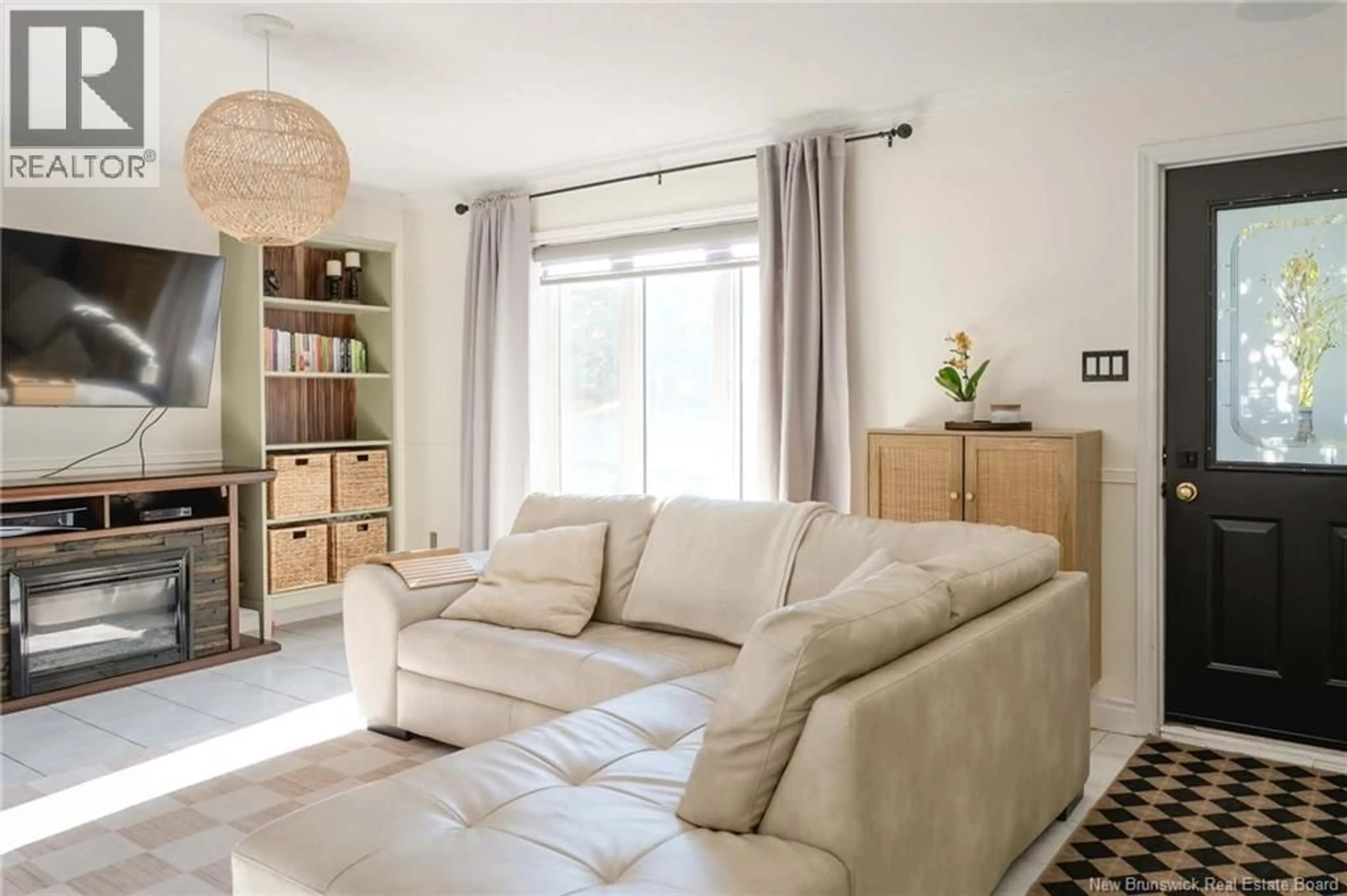 Living room with furniture, unknown for 4 MGR ROY AVE, Edmundston New Brunswick E3V4G4