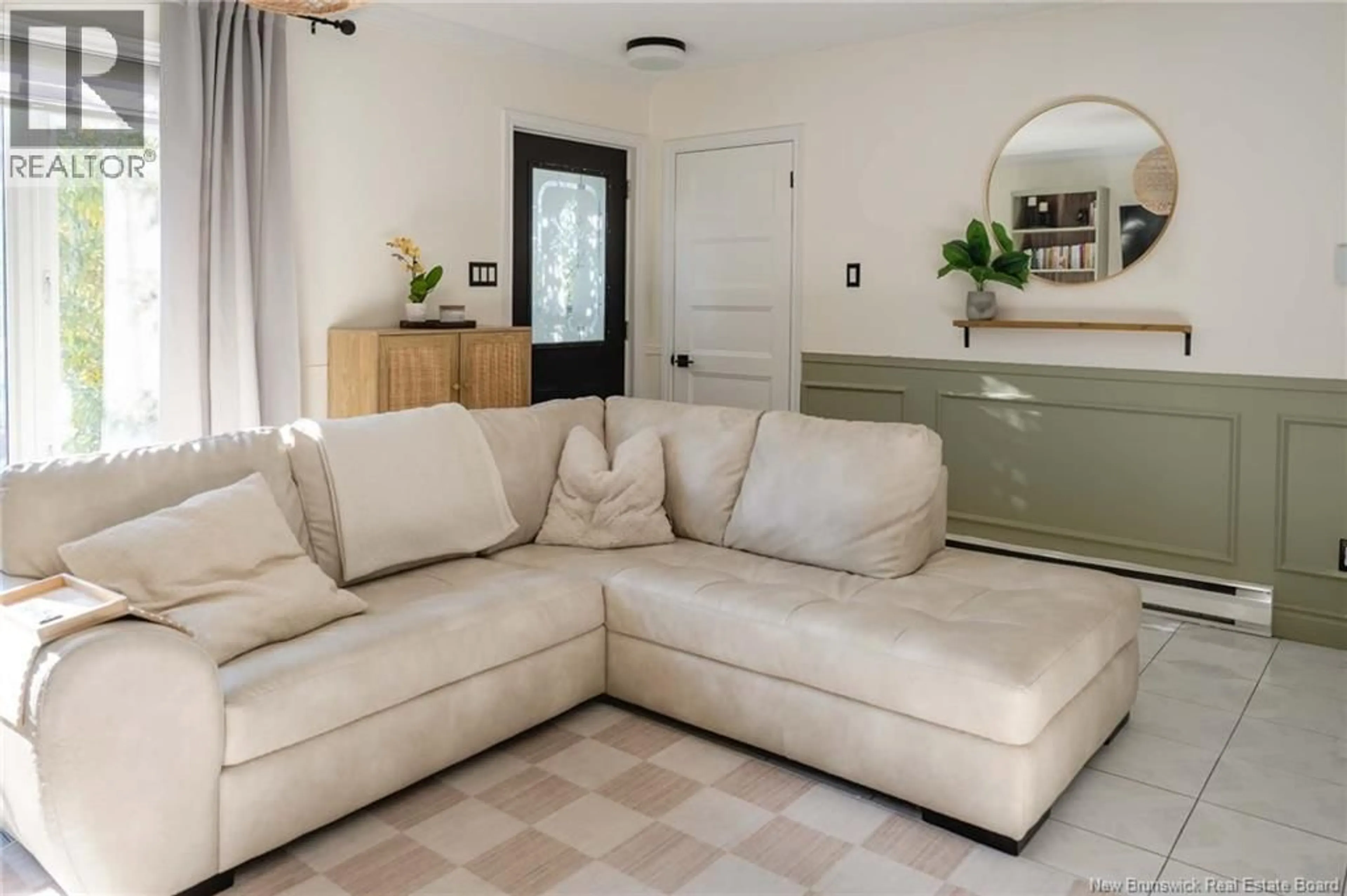 Living room with furniture, ceramic/tile floor for 4 MGR ROY AVE, Edmundston New Brunswick E3V4G4