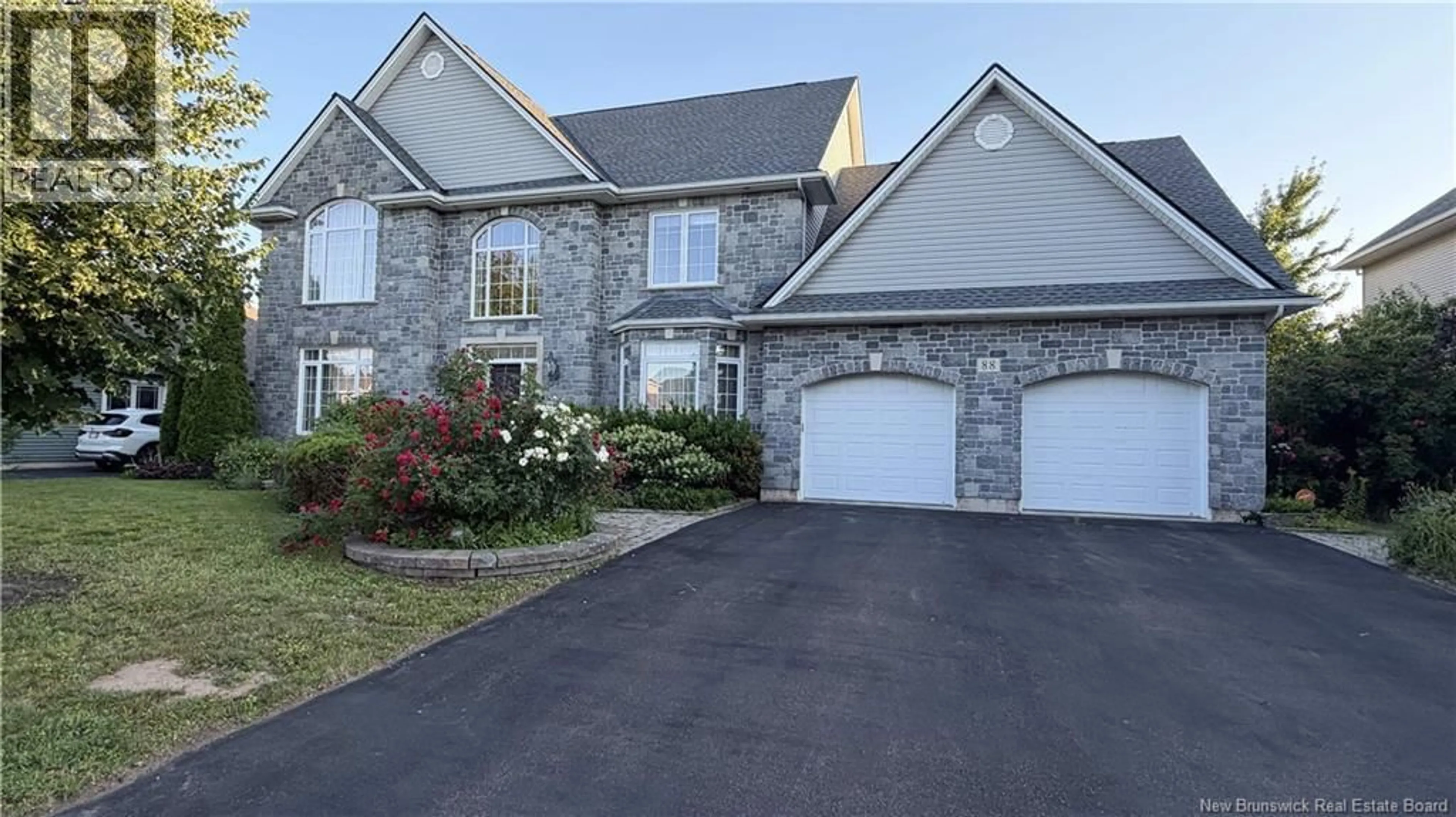 Home with vinyl exterior material, street for 88 FOXWOOD DRIVE, Moncton New Brunswick E1G5H4