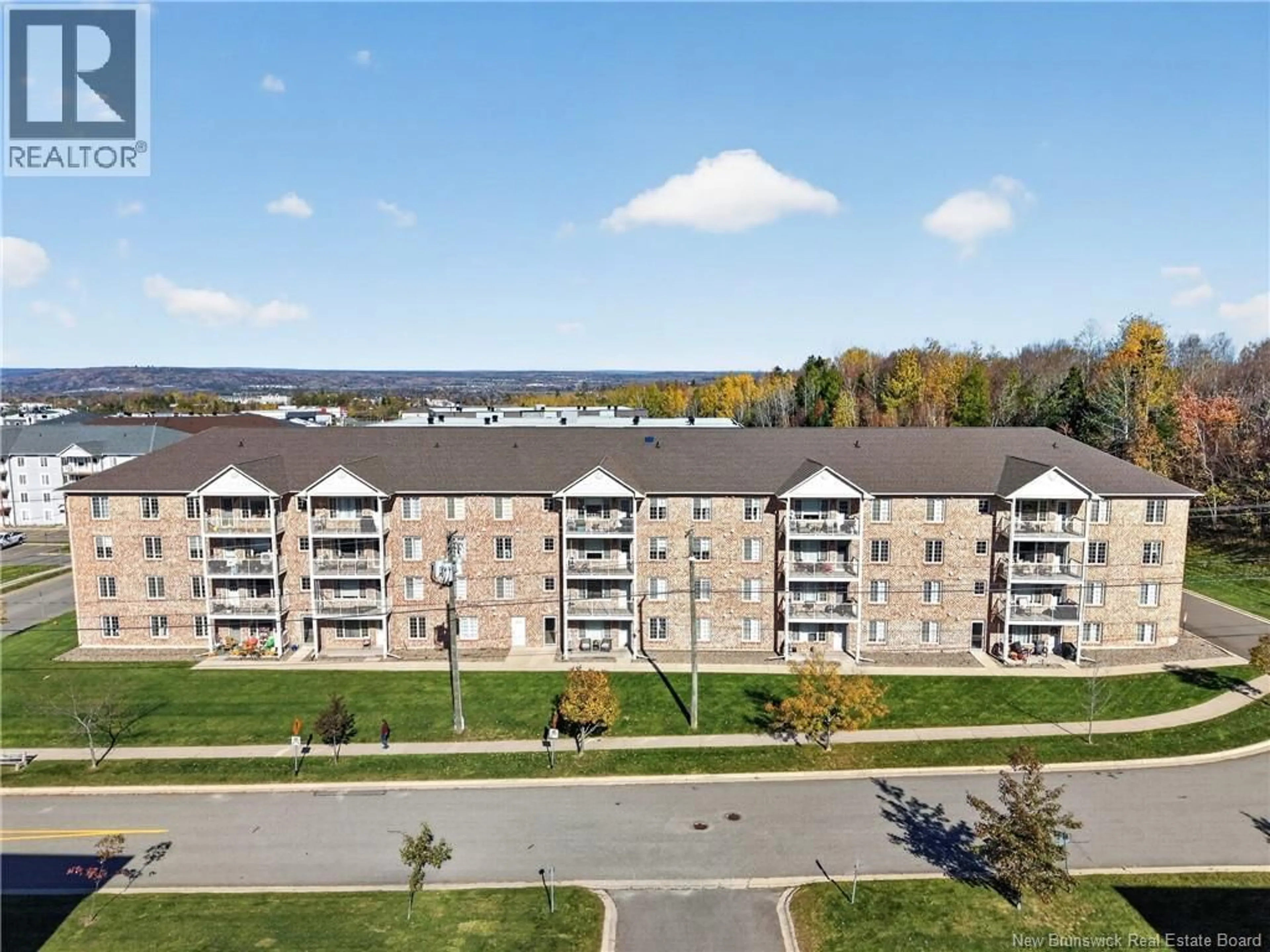 A pic from outside/outdoor area/front of a property/back of a property/a pic from drone, unknown for 329 - 165 VALCOUR DRIVE, Fredericton New Brunswick E3C0H5