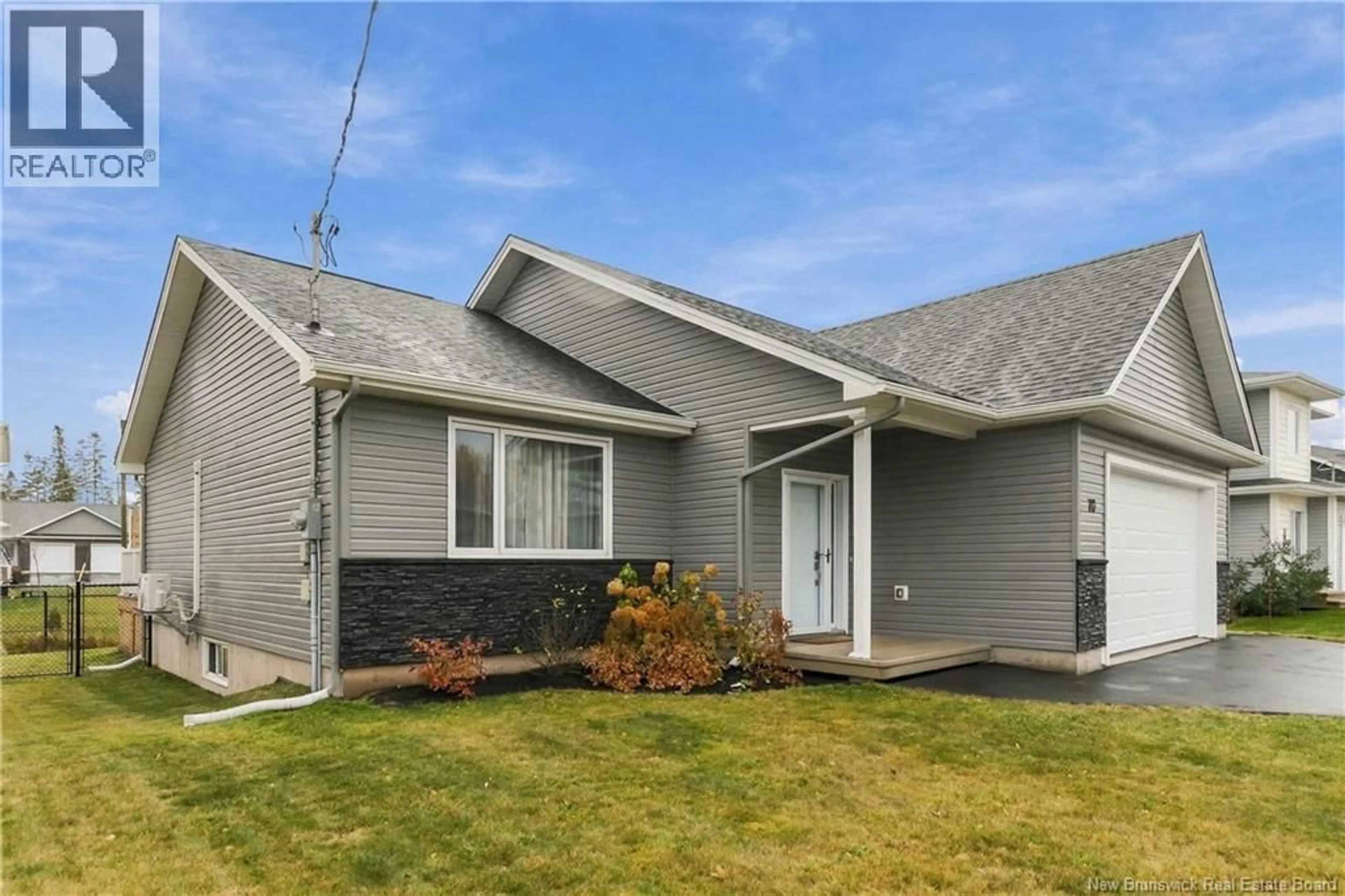 Home with vinyl exterior material, street for 70 SATARA DRIVE, Moncton New Brunswick E1G6A6