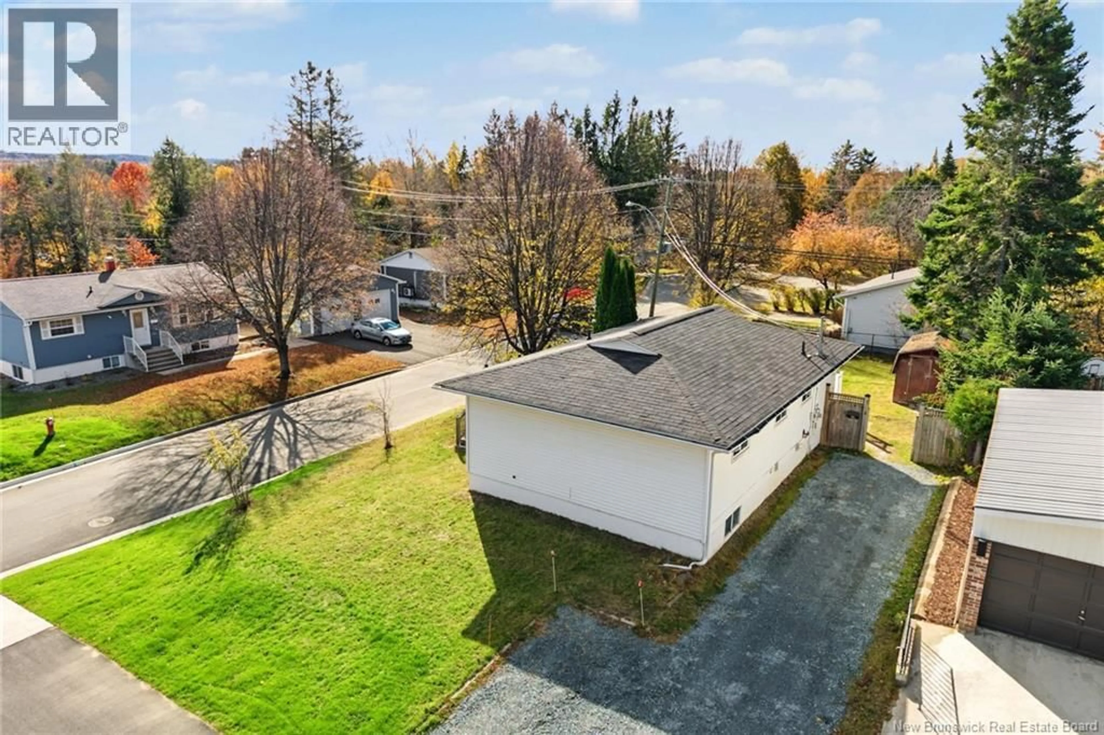 A pic from outside/outdoor area/front of a property/back of a property/a pic from drone, street for 2 MCINNIS COURT, Fredericton New Brunswick E3A4G9