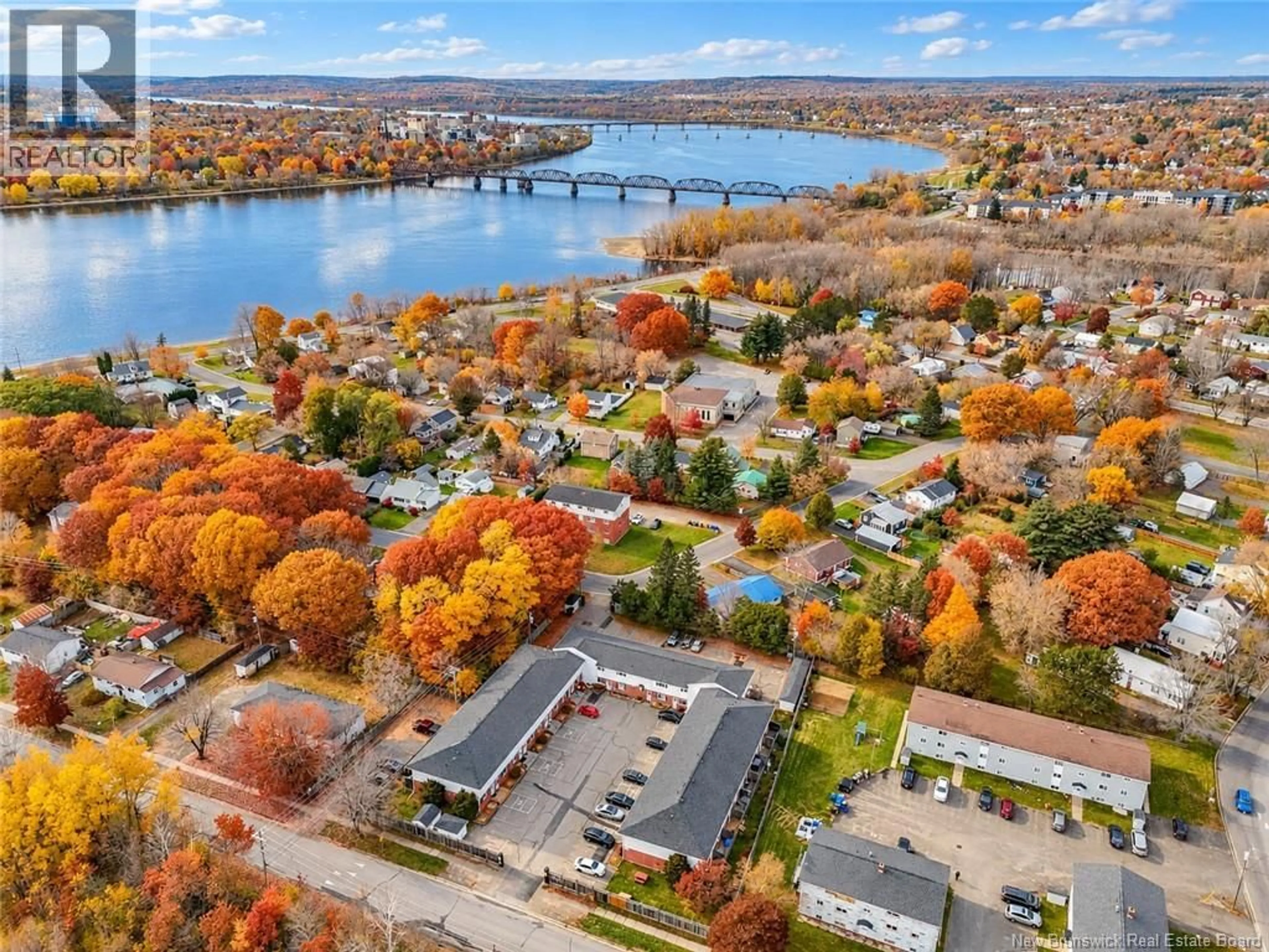A pic from outside/outdoor area/front of a property/back of a property/a pic from drone, water/lake/river/ocean view for 3 - 60 COLWELL DRIVE, Fredericton New Brunswick E3A6R3
