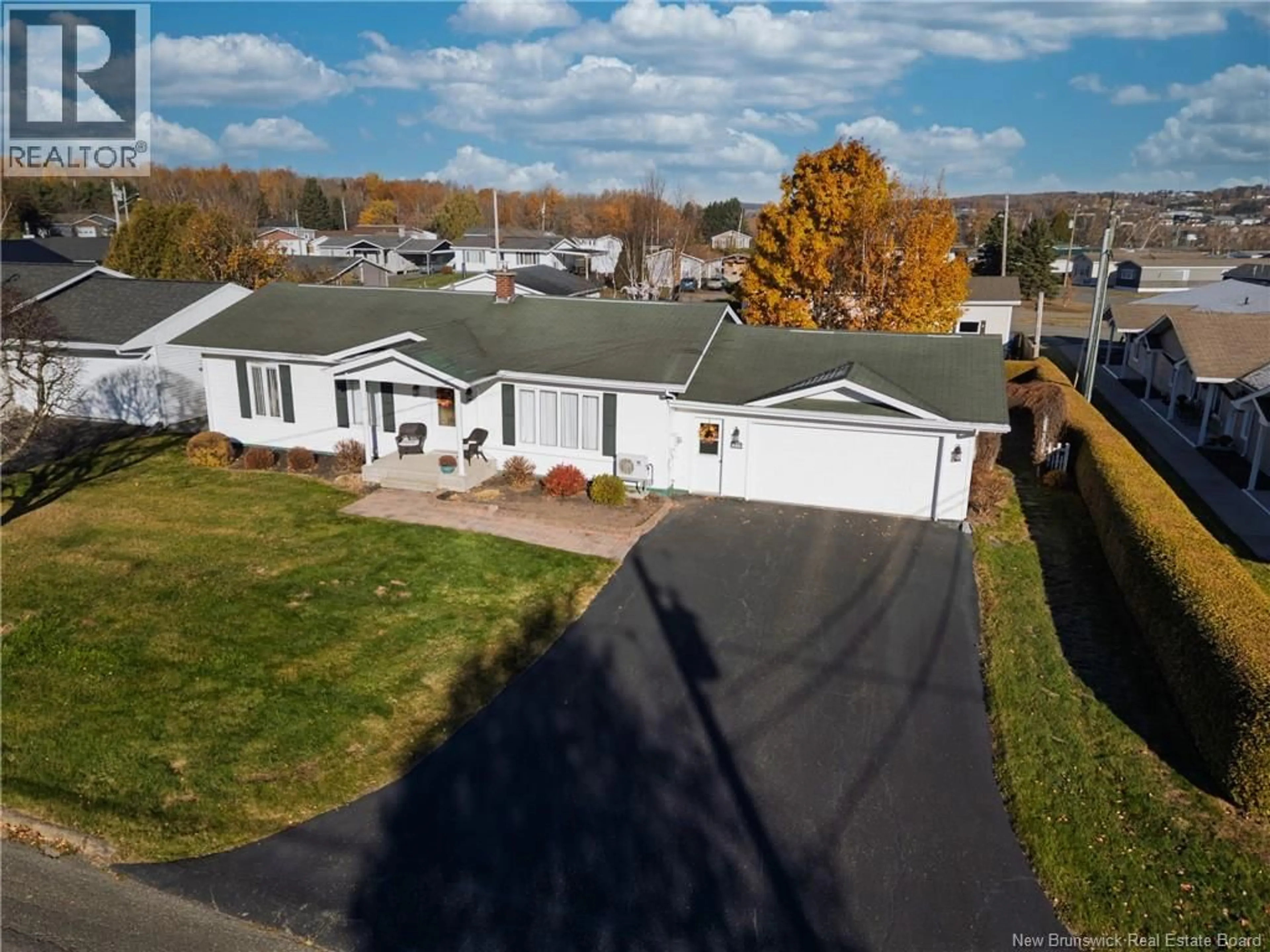 A pic from outside/outdoor area/front of a property/back of a property/a pic from drone, water/lake/river/ocean view for 556 FIRST AVE, Grand Falls New Brunswick E3Z1B3