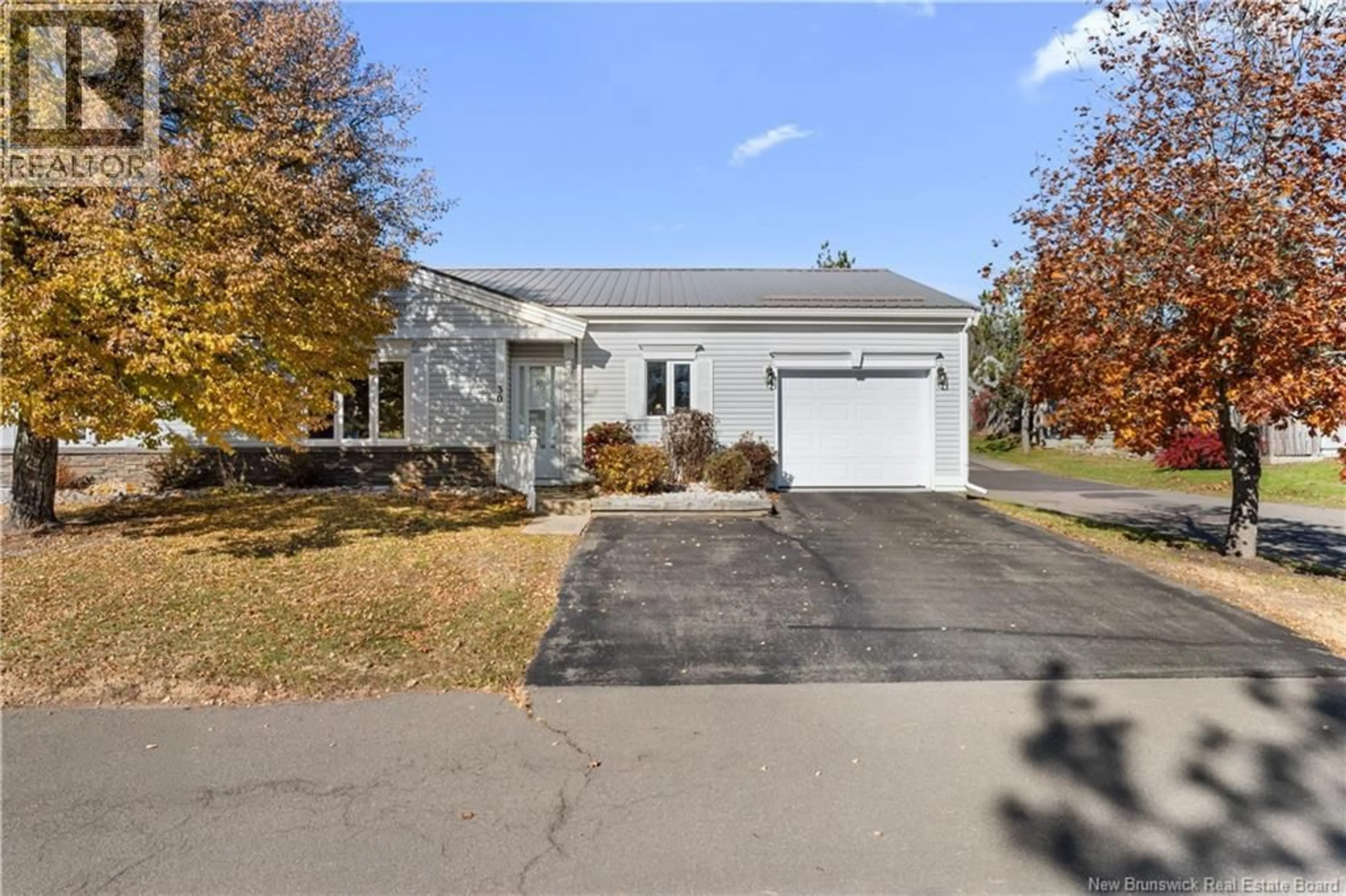 Home with vinyl exterior material, street for 30 - 50 MCAULEY DRIVE, Moncton New Brunswick E1A6R2