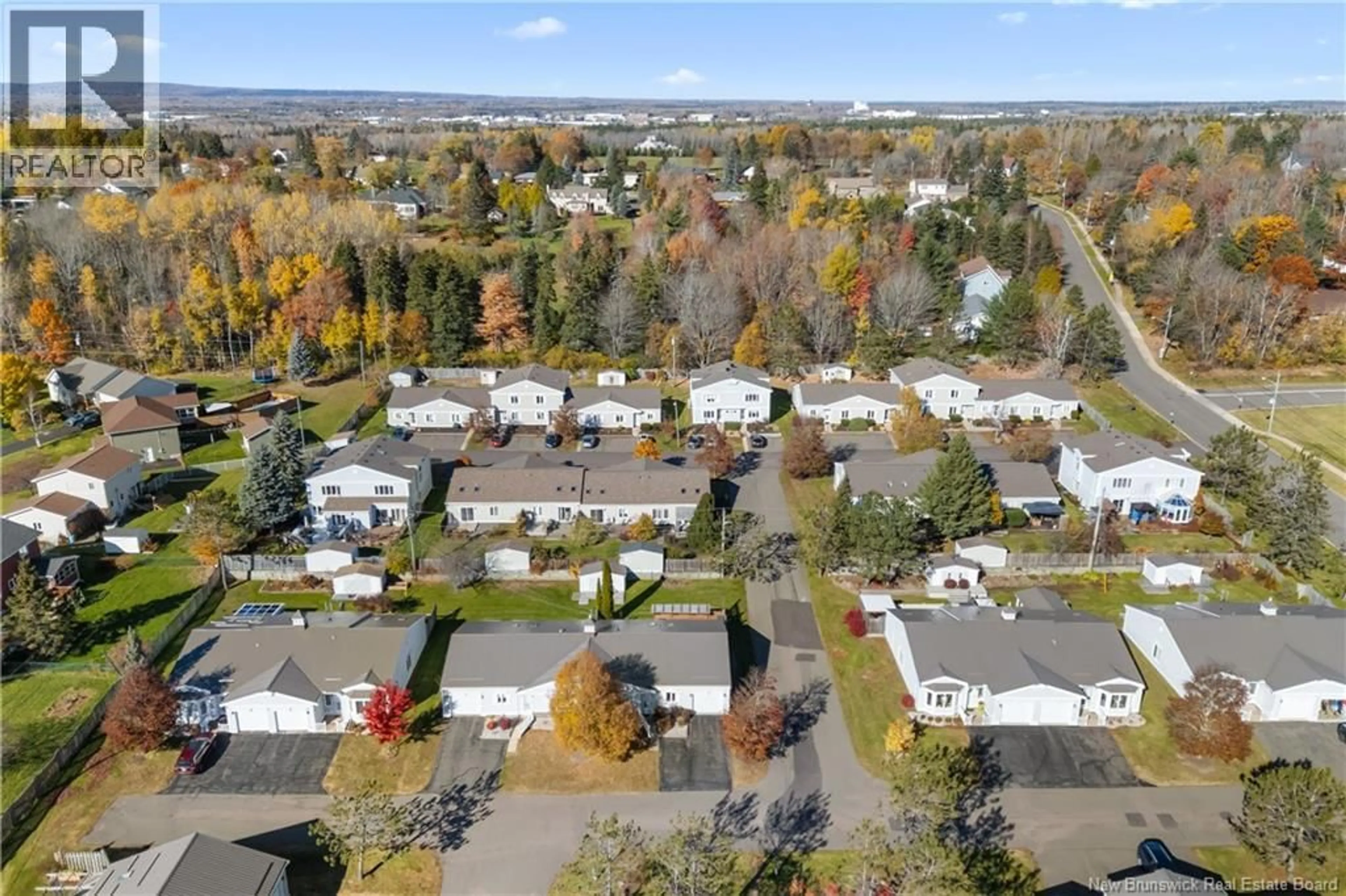 A pic from outside/outdoor area/front of a property/back of a property/a pic from drone, street for 30 - 50 MCAULEY DRIVE, Moncton New Brunswick E1A6R2
