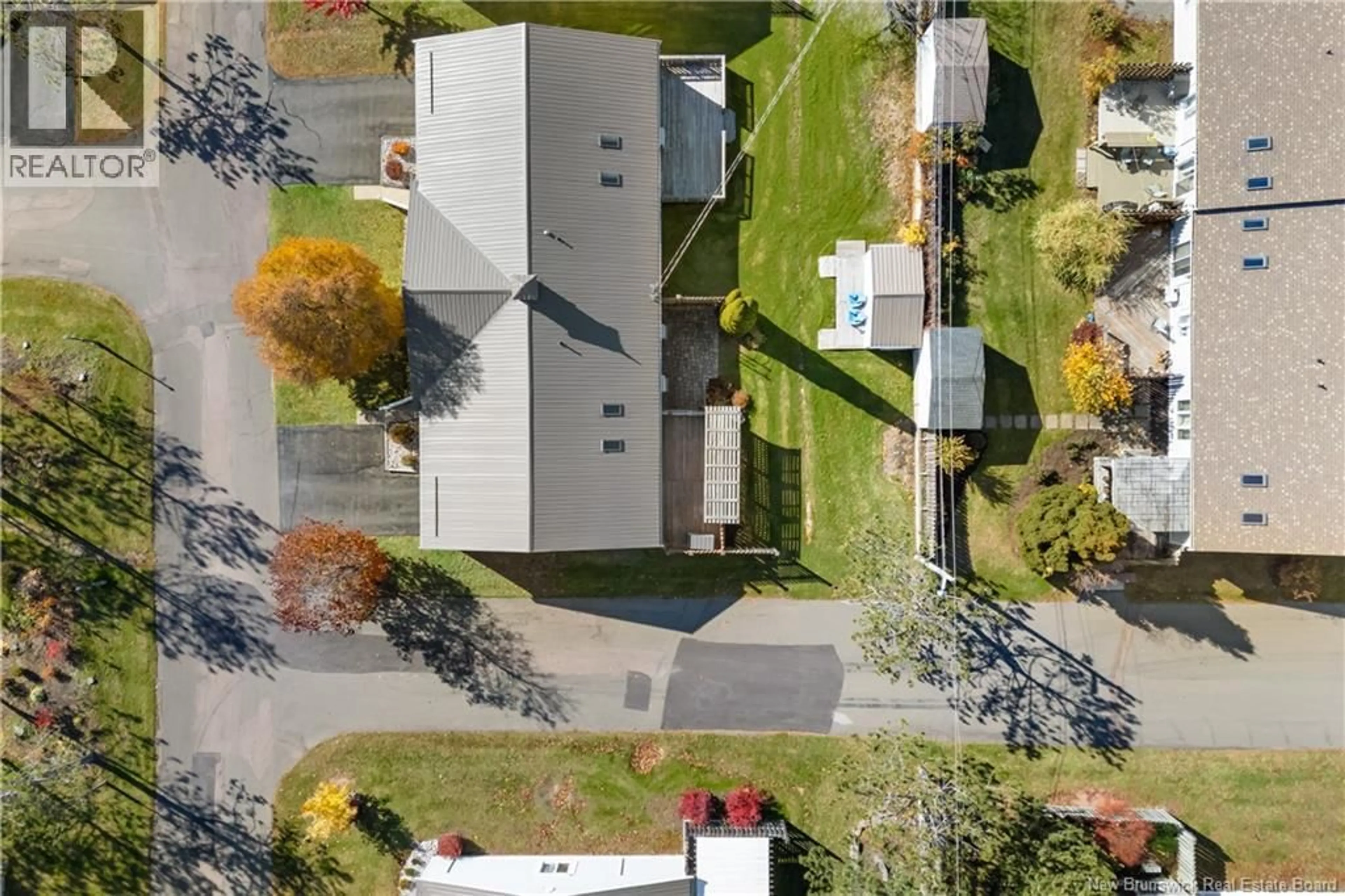 A pic from outside/outdoor area/front of a property/back of a property/a pic from drone, street for 30 - 50 MCAULEY DRIVE, Moncton New Brunswick E1A6R2
