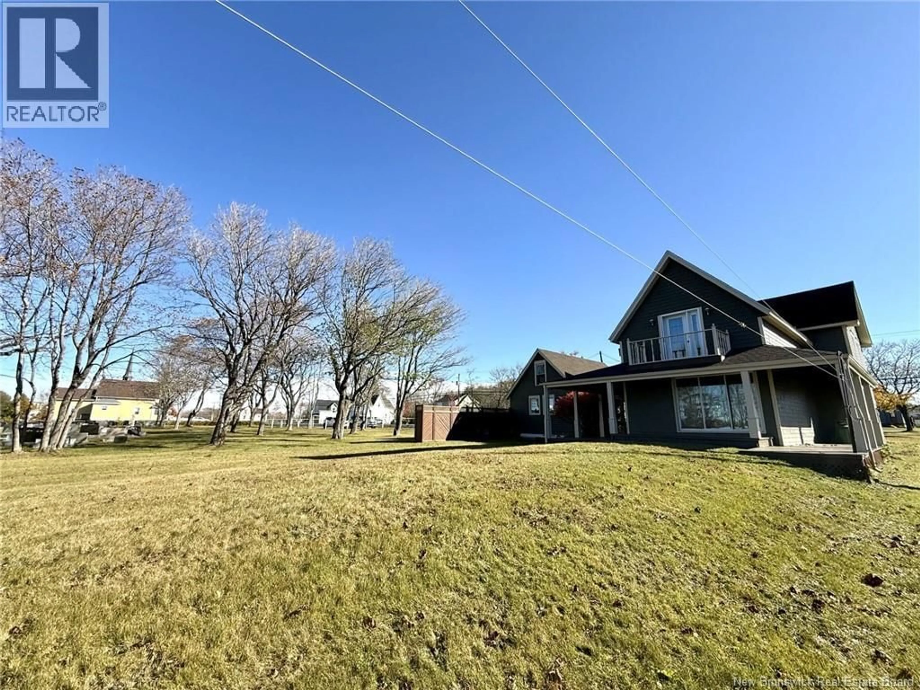 A pic from outside/outdoor area/front of a property/back of a property/a pic from drone, unknown for 241 BOUL. ST-PIERRE OUEST, Caraquet New Brunswick E1W1A4