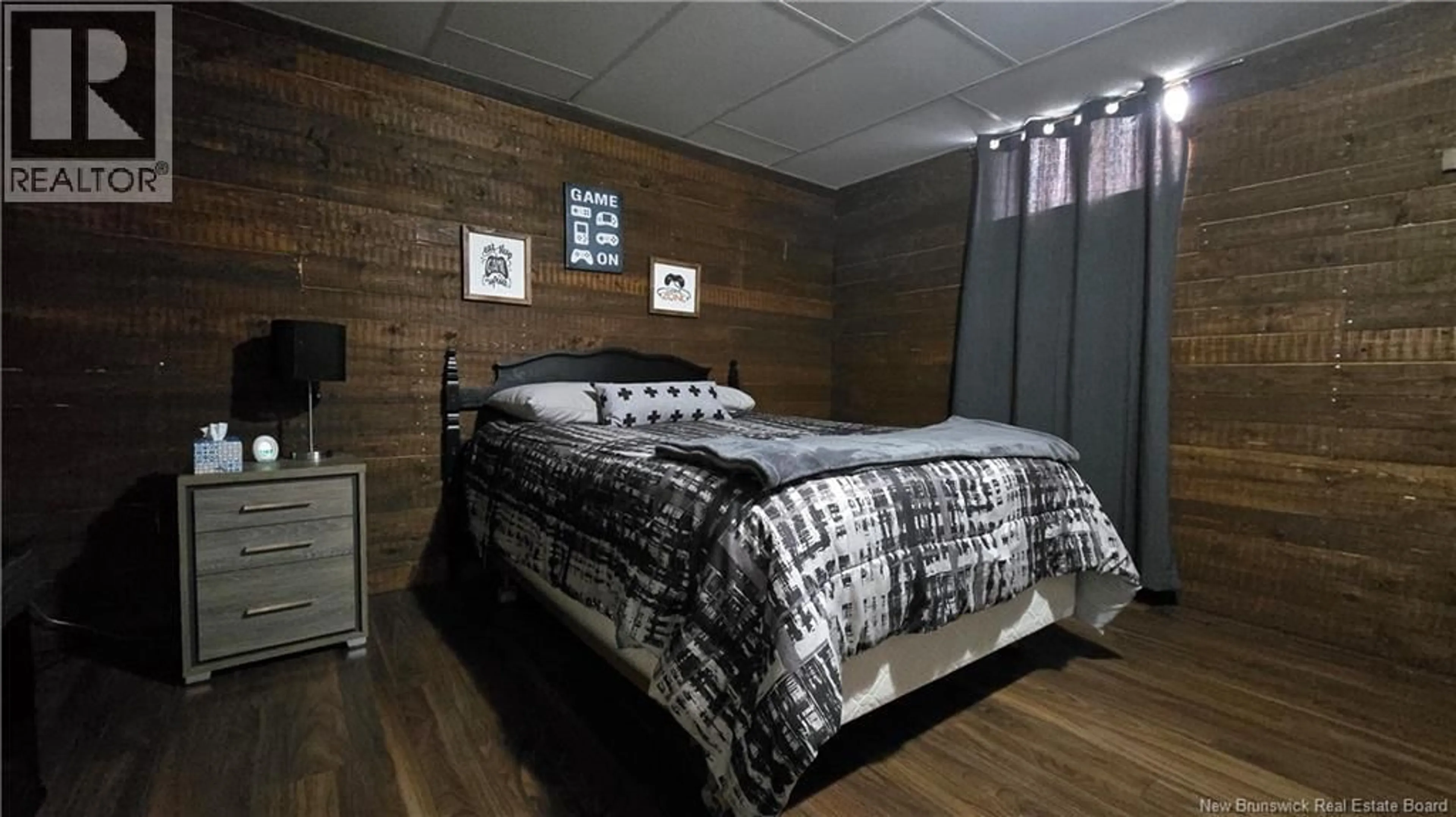 Bedroom with bed, wood/laminate floor for 341 VIMY STREET, Dalhousie New Brunswick E8V2V9
