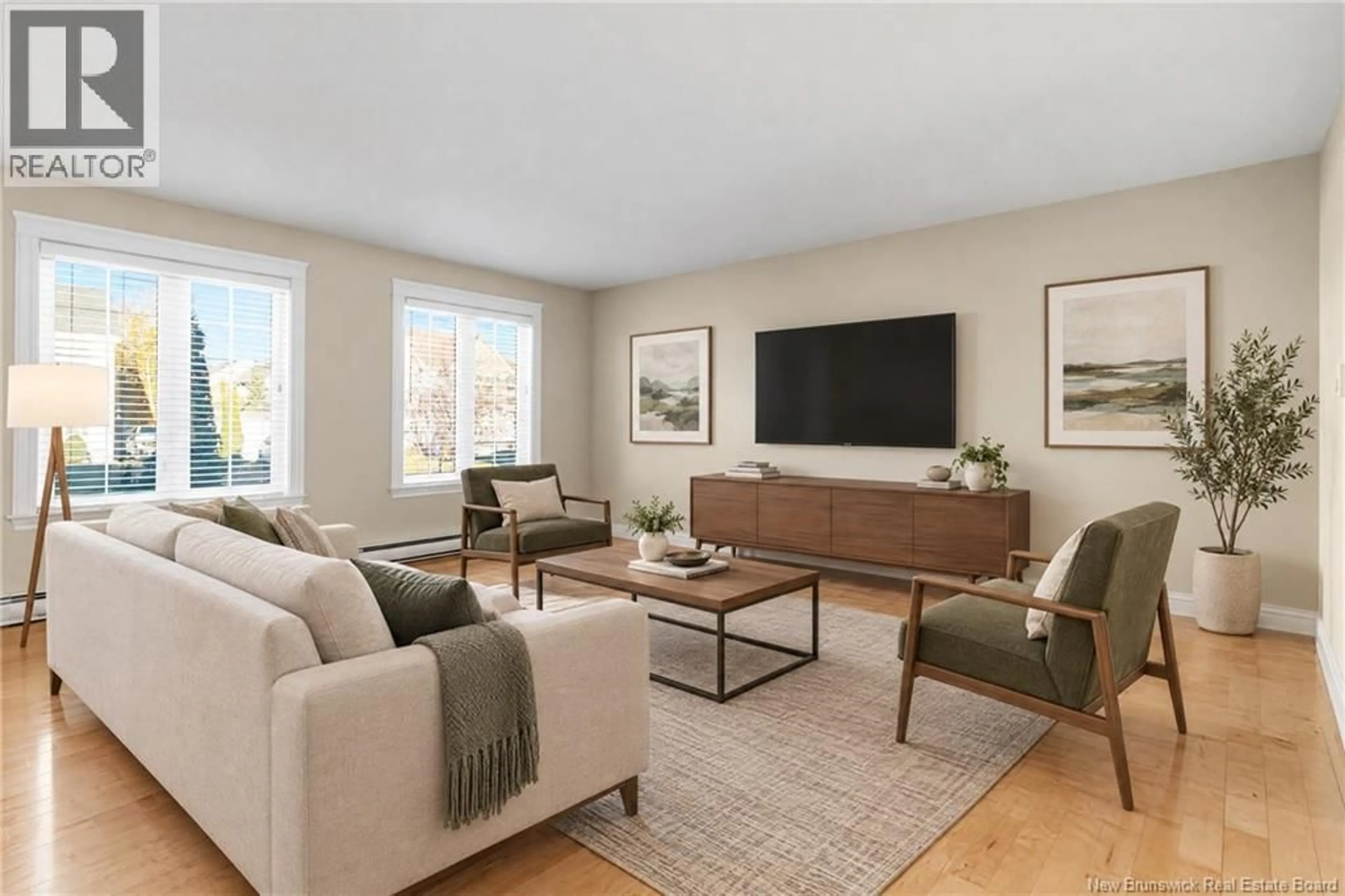Living room with furniture, wood/laminate floor for 95 CHRISTOPHER CRESCENT, Moncton New Brunswick E1G3V9