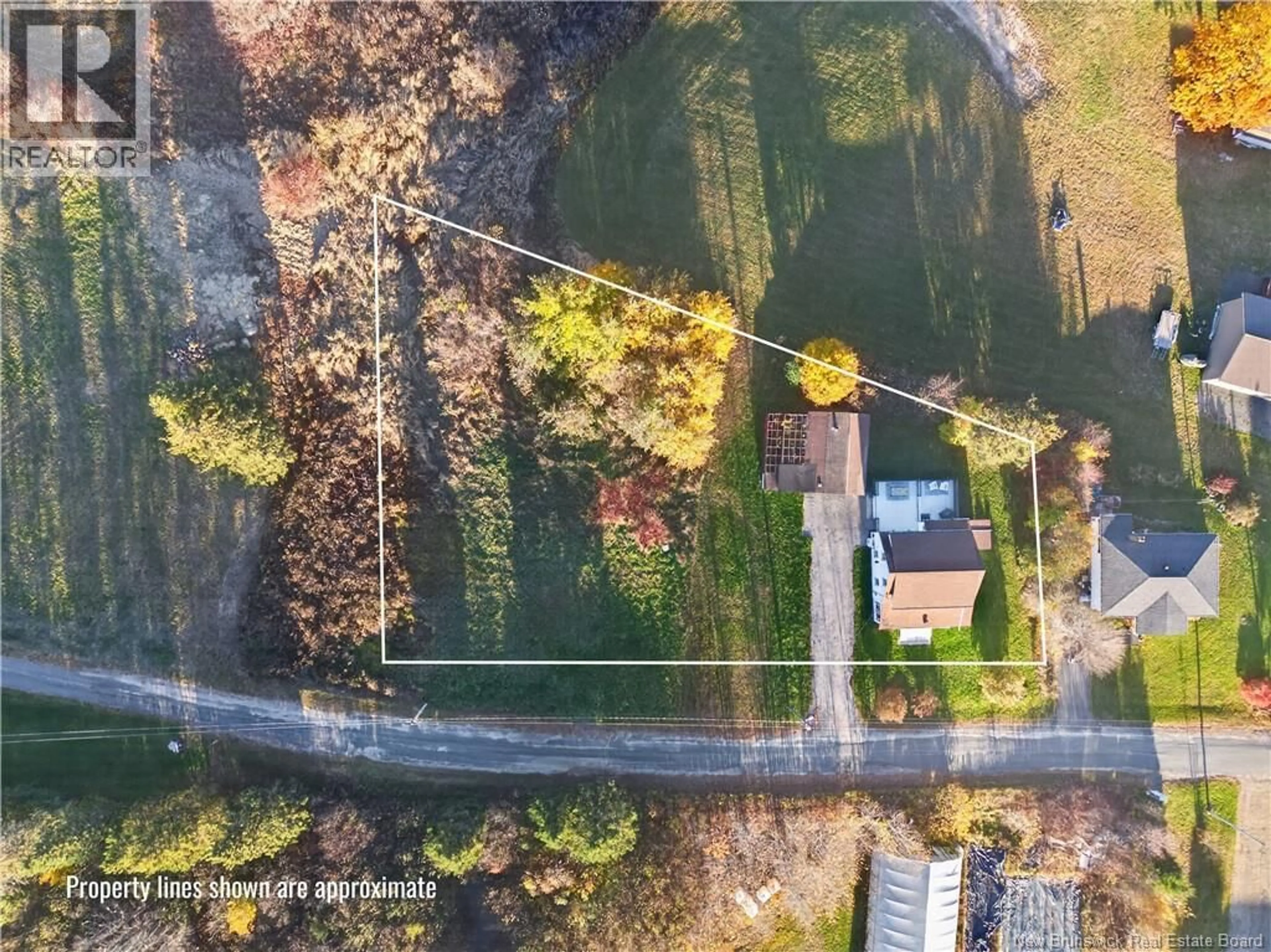 A pic from outside/outdoor area/front of a property/back of a property/a pic from drone, unknown for 12 DUNNETTS ROAD, Whitney New Brunswick E1V4K9