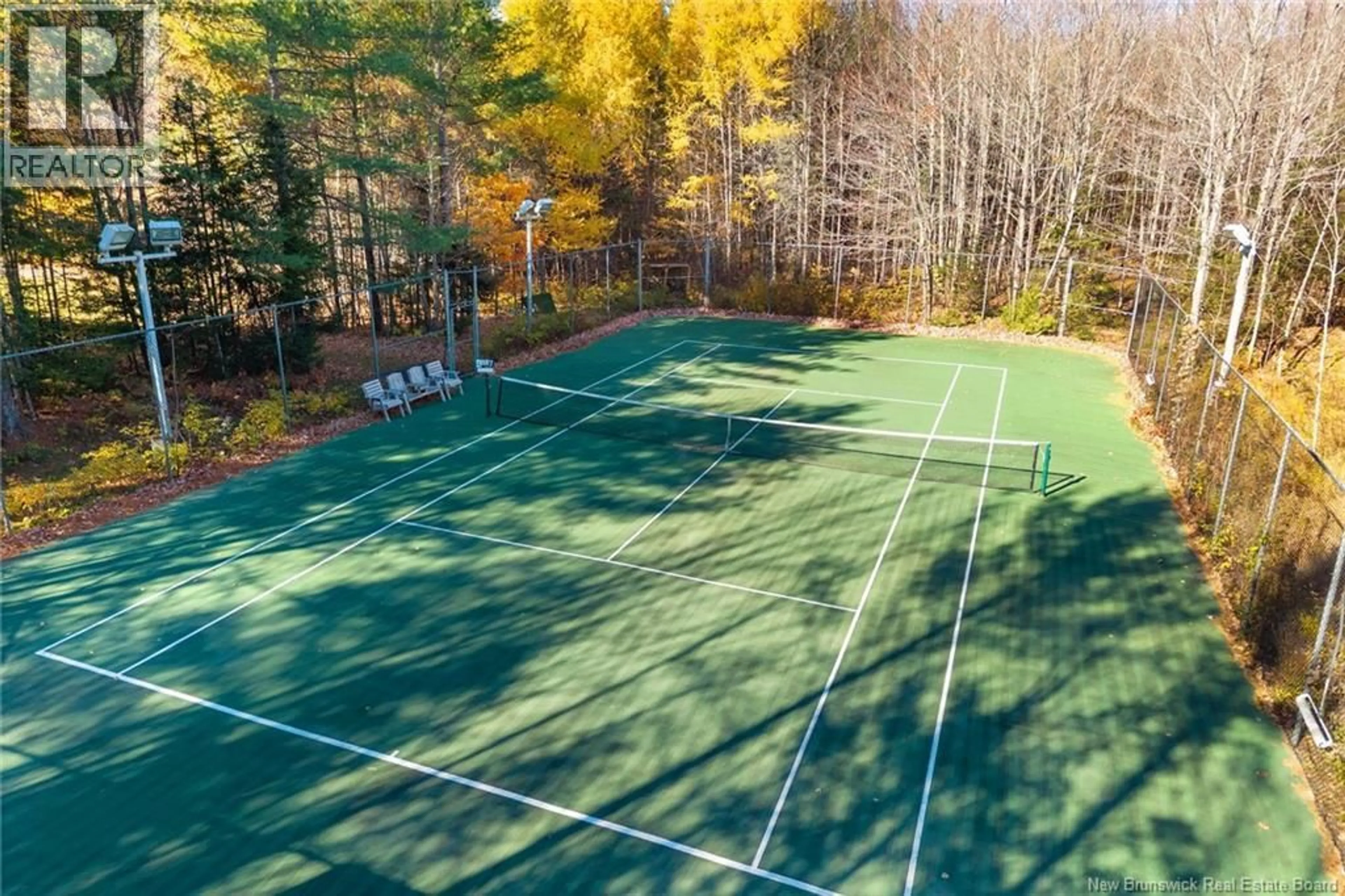 A pic from outside/outdoor area/front of a property/back of a property/a pic from drone, forest/trees view for 18 PELICAN COURT, Hanwell New Brunswick E3E2L8