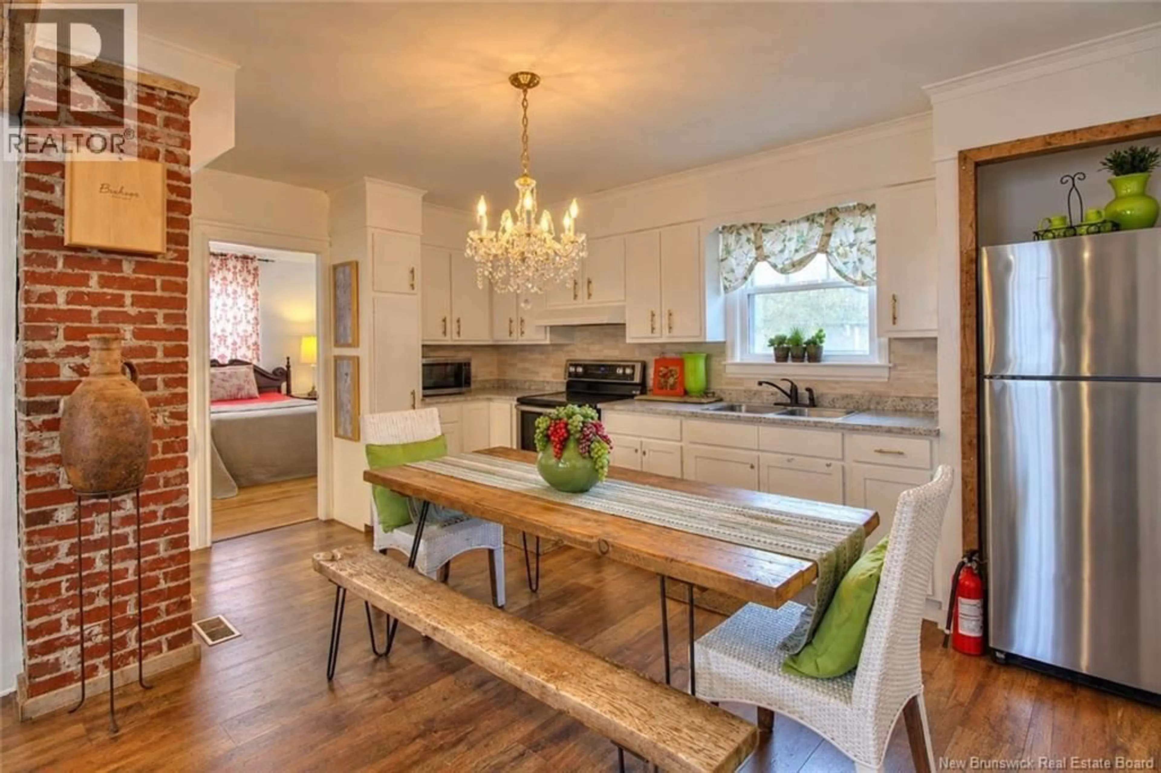Open concept kitchen, wood/laminate floor for 19 BISHOP, Moncton New Brunswick E1E1K4
