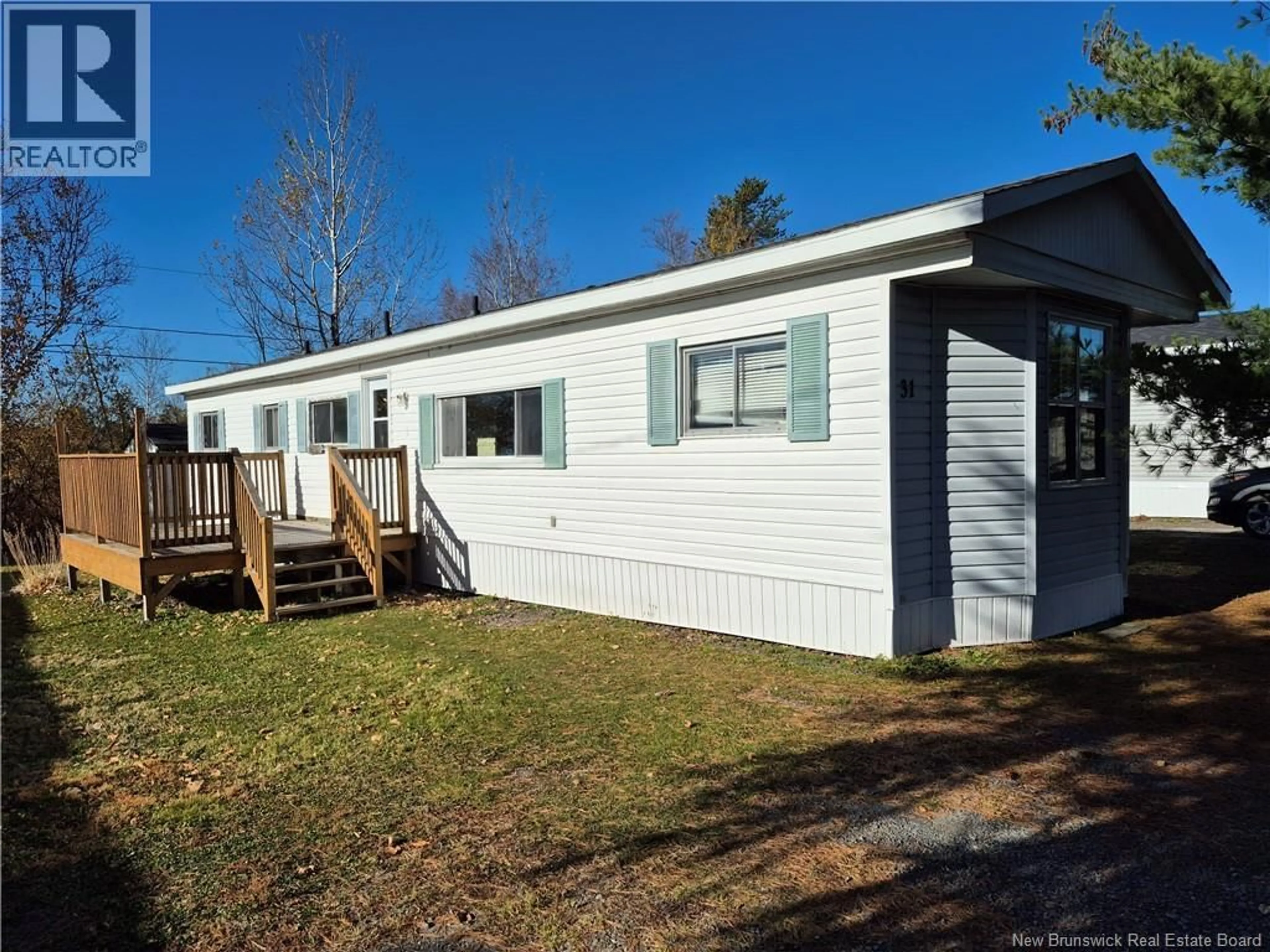 Home with vinyl exterior material, unknown for 31 NORTHWOOD STREET, Hanwell New Brunswick E3B6R2