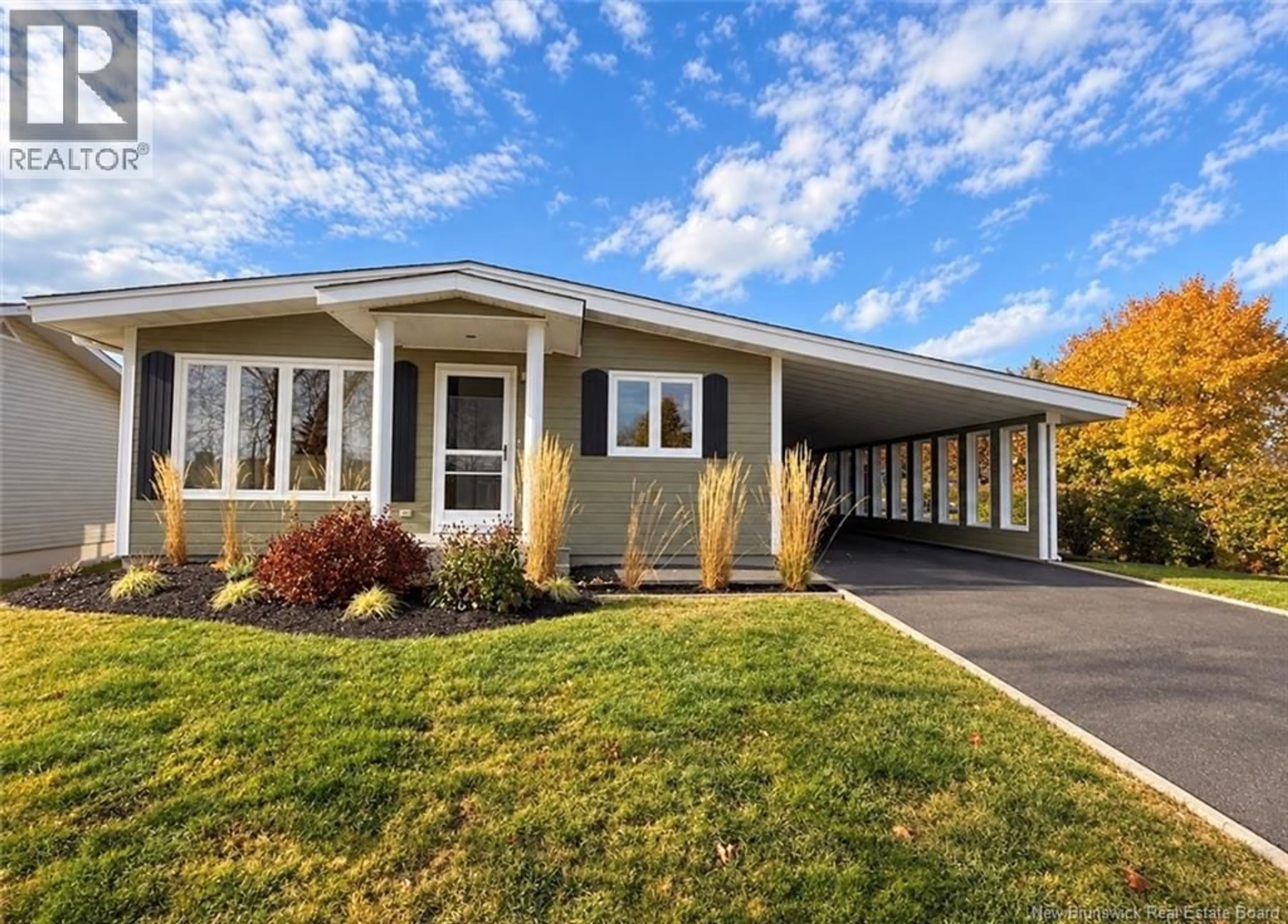 Home with vinyl exterior material, street for 28 ÉMILE-SIMARD AVENUE, Edmundston New Brunswick E3V3P9