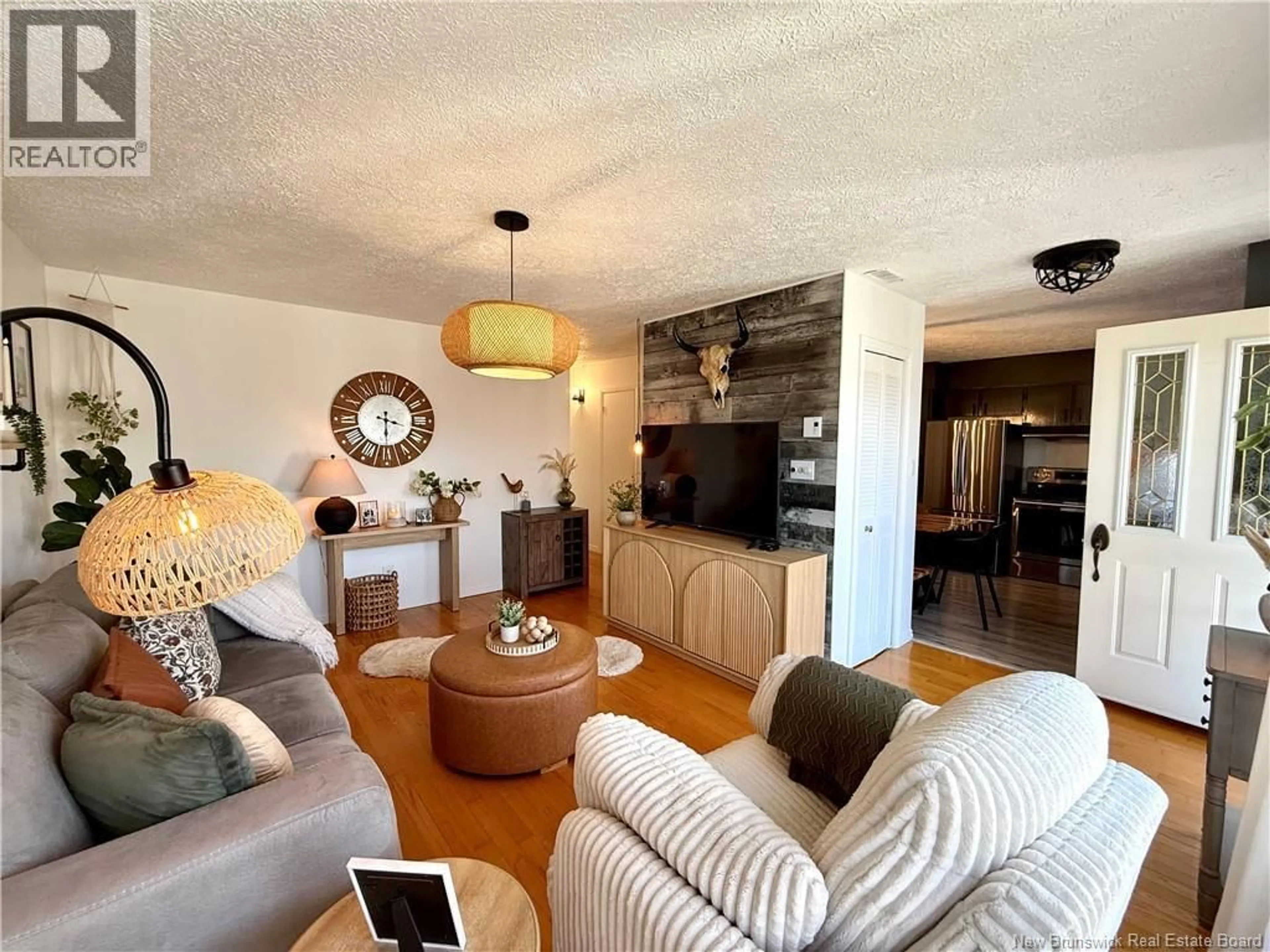 Living room with furniture, unknown for 28 ÉMILE-SIMARD AVENUE, Edmundston New Brunswick E3V3P9