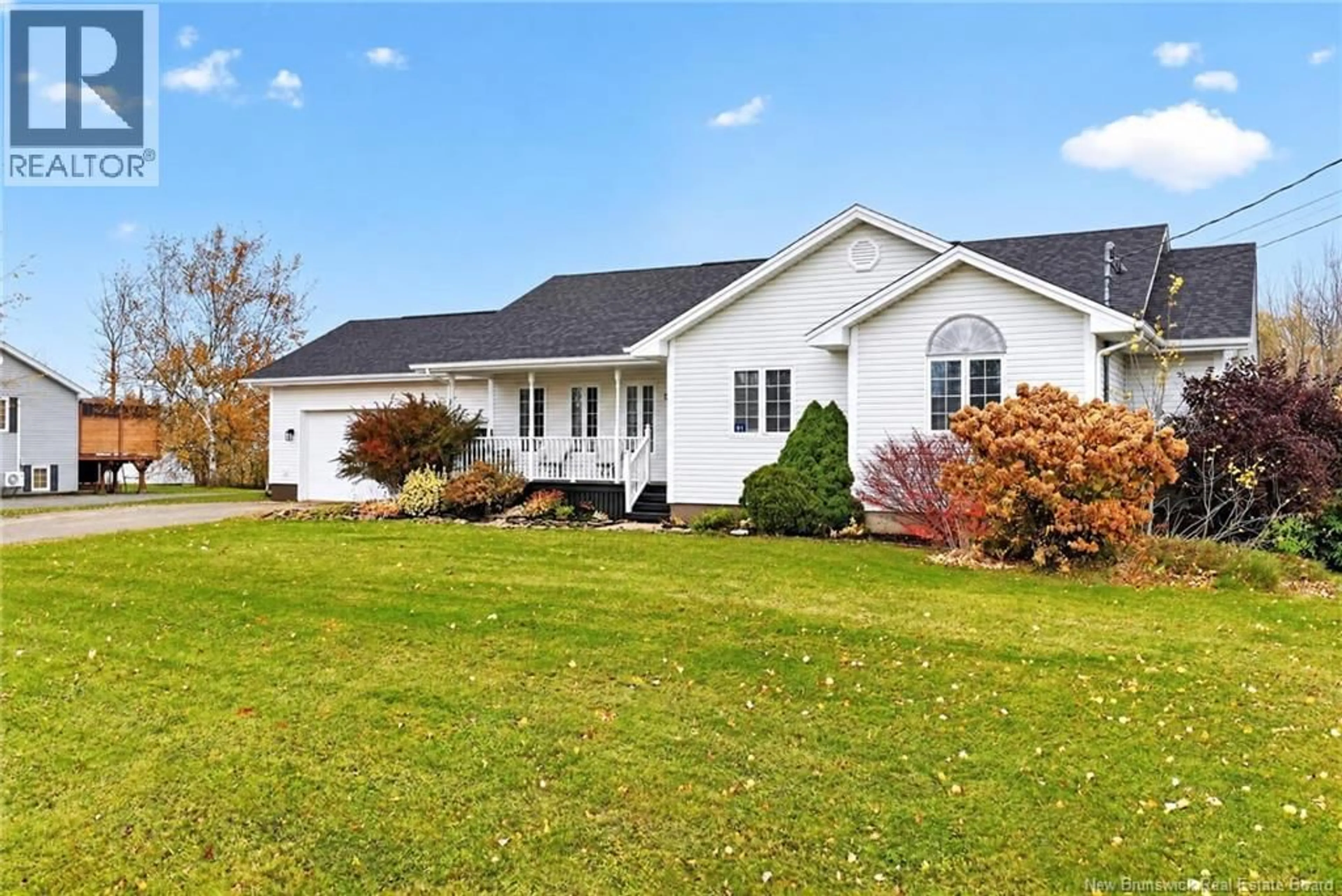 Home with vinyl exterior material, street for 91 LEGER STREET, Saint-Antoine New Brunswick E4V1J6