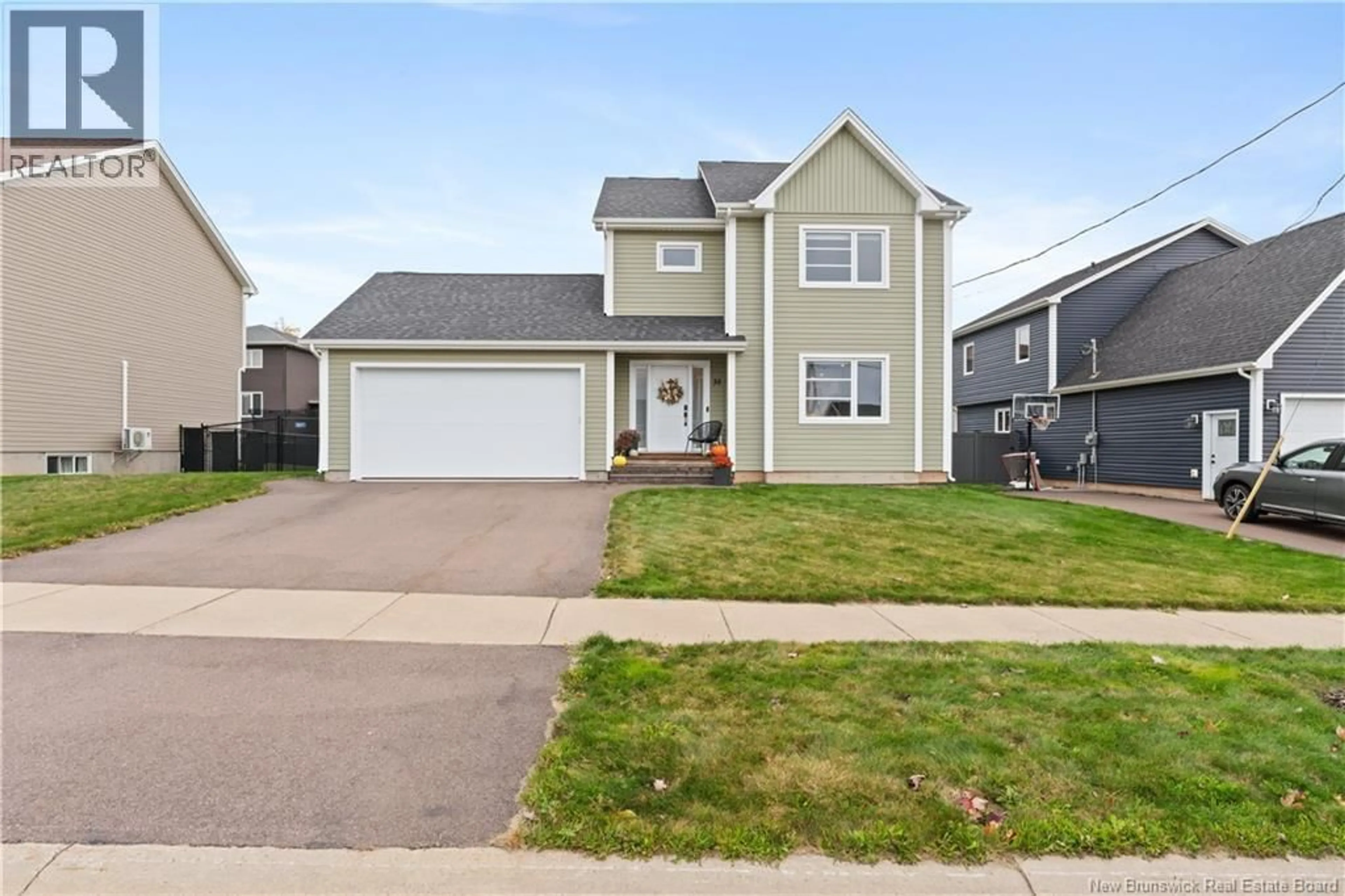 Home with vinyl exterior material, street for 35 AMITY, Moncton New Brunswick E1G0S4