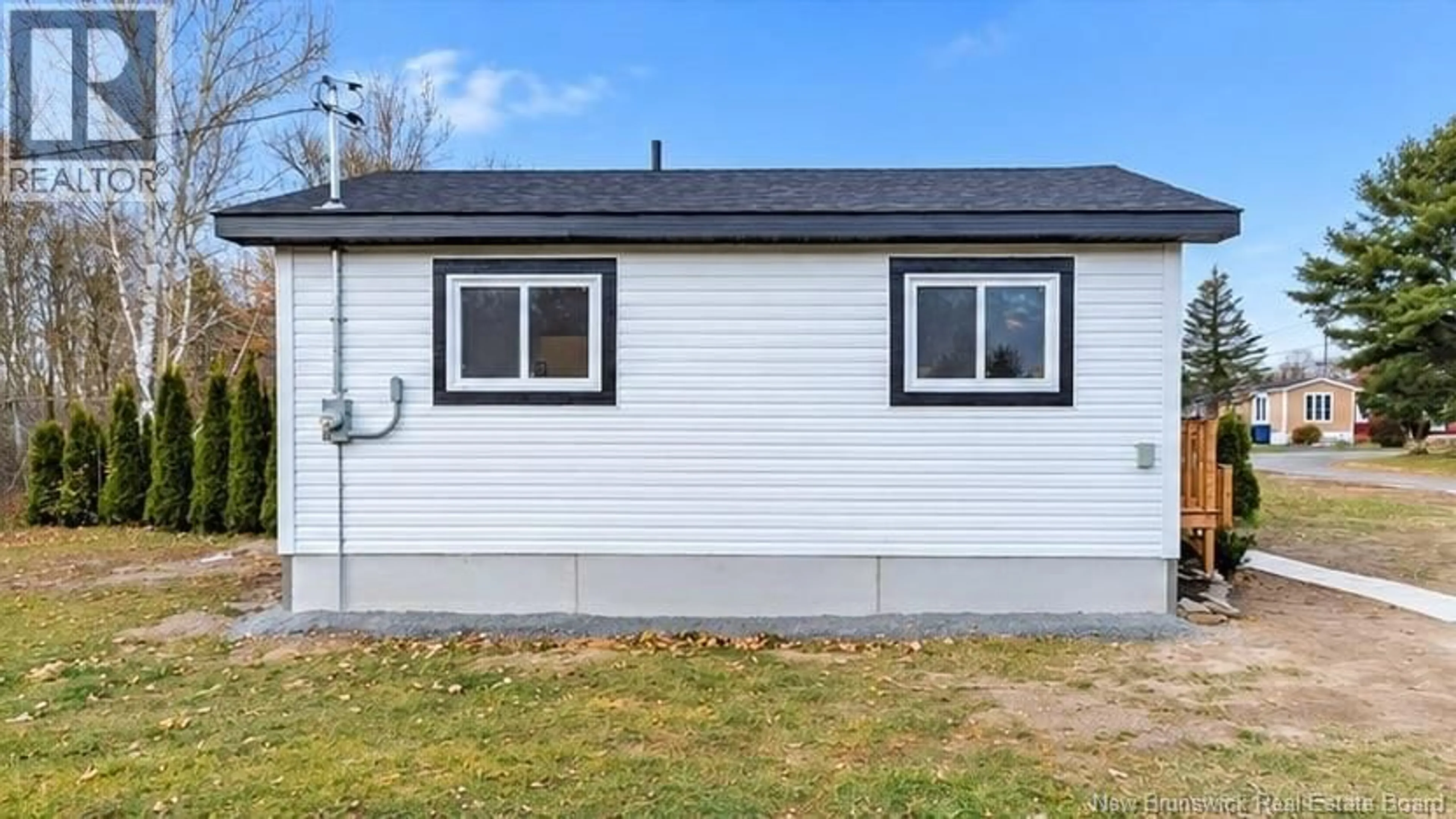 Home with vinyl exterior material, building for 229 POPLAR, Beresford New Brunswick E8K1E5