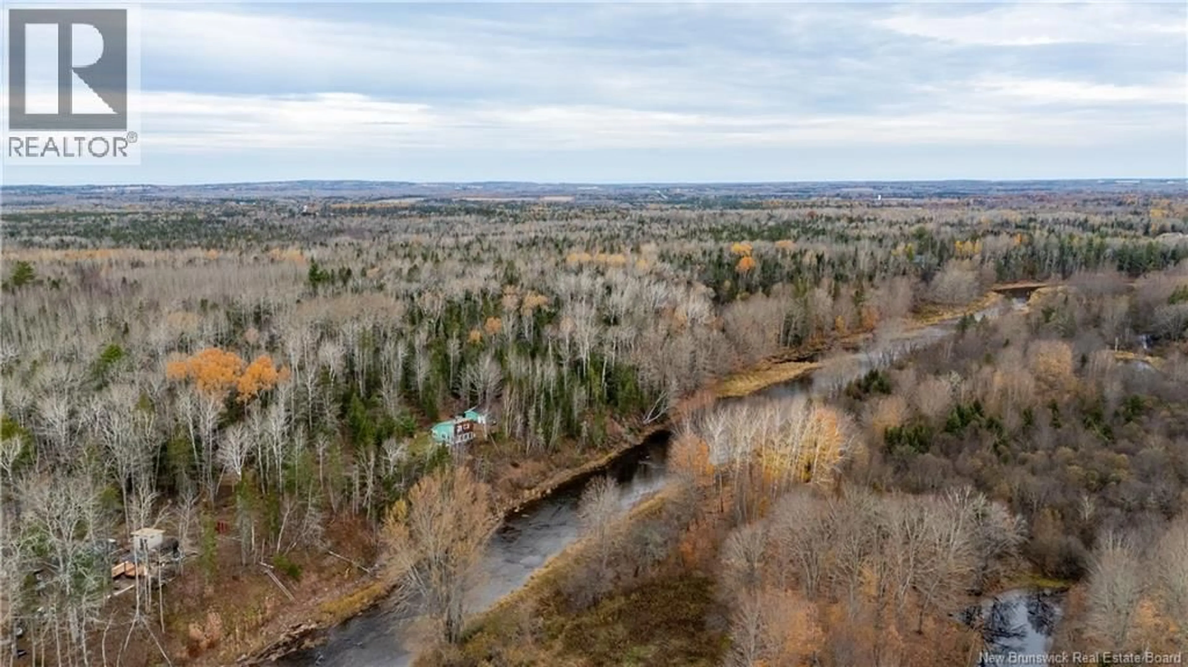 A pic from outside/outdoor area/front of a property/back of a property/a pic from drone, forest/trees view for 82 GELDART ROAD, River Glade New Brunswick E4Z3G7