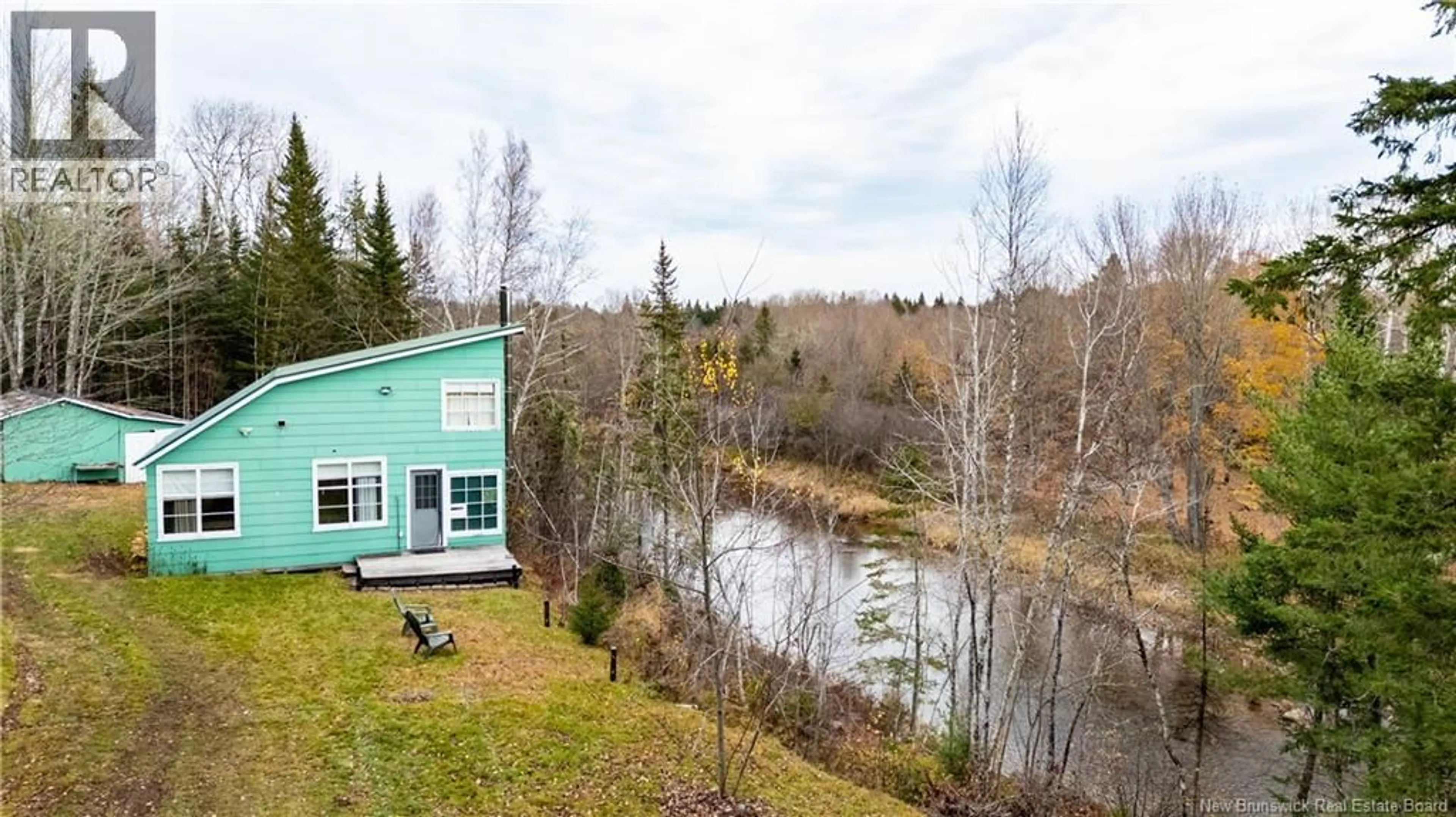 A pic from outside/outdoor area/front of a property/back of a property/a pic from drone, water/lake/river/ocean view for 82 GELDART ROAD, River Glade New Brunswick E4Z3G7